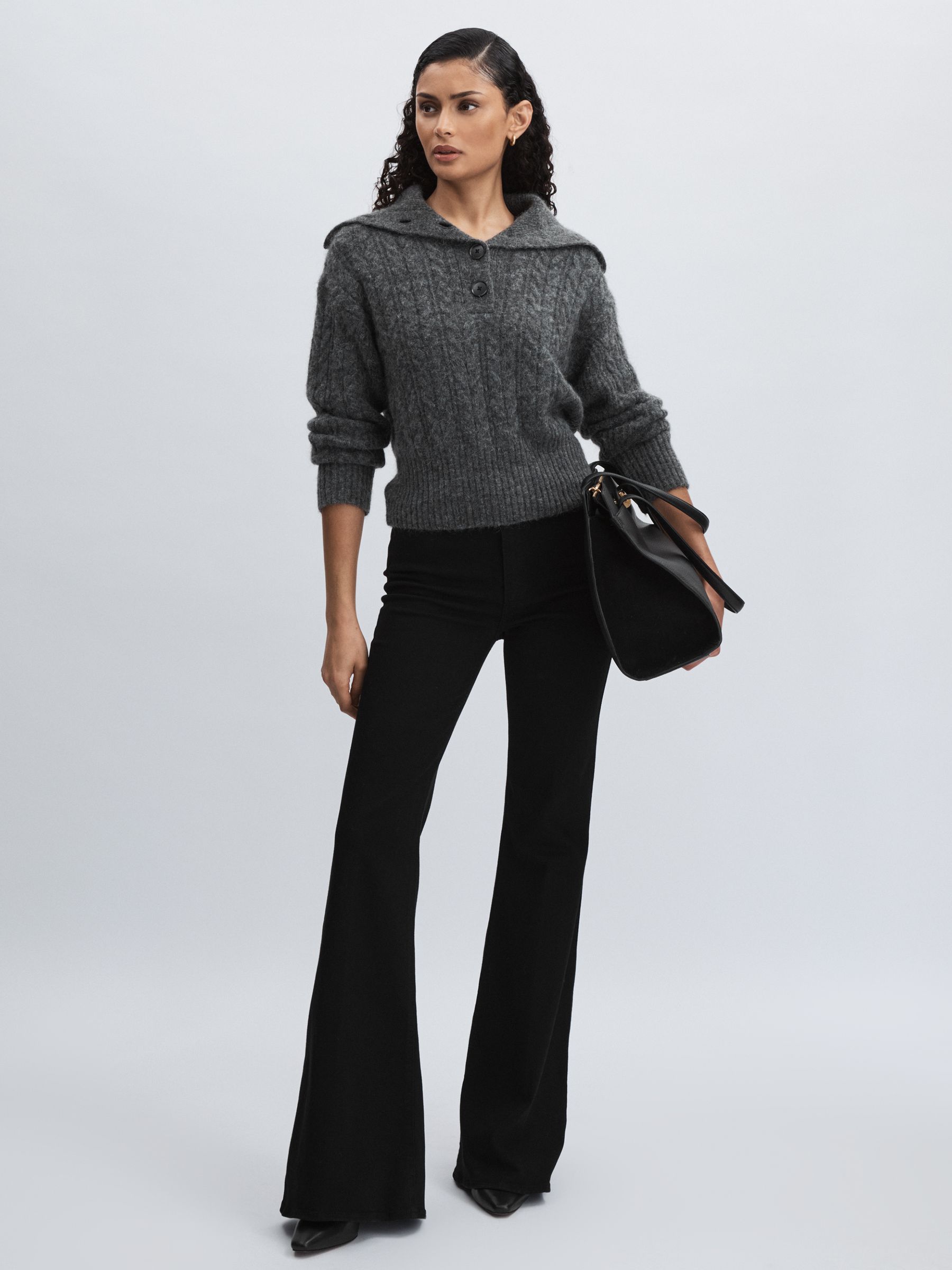 Paige Angled Waist Flared Jeans in Black - Image 1 of 6
