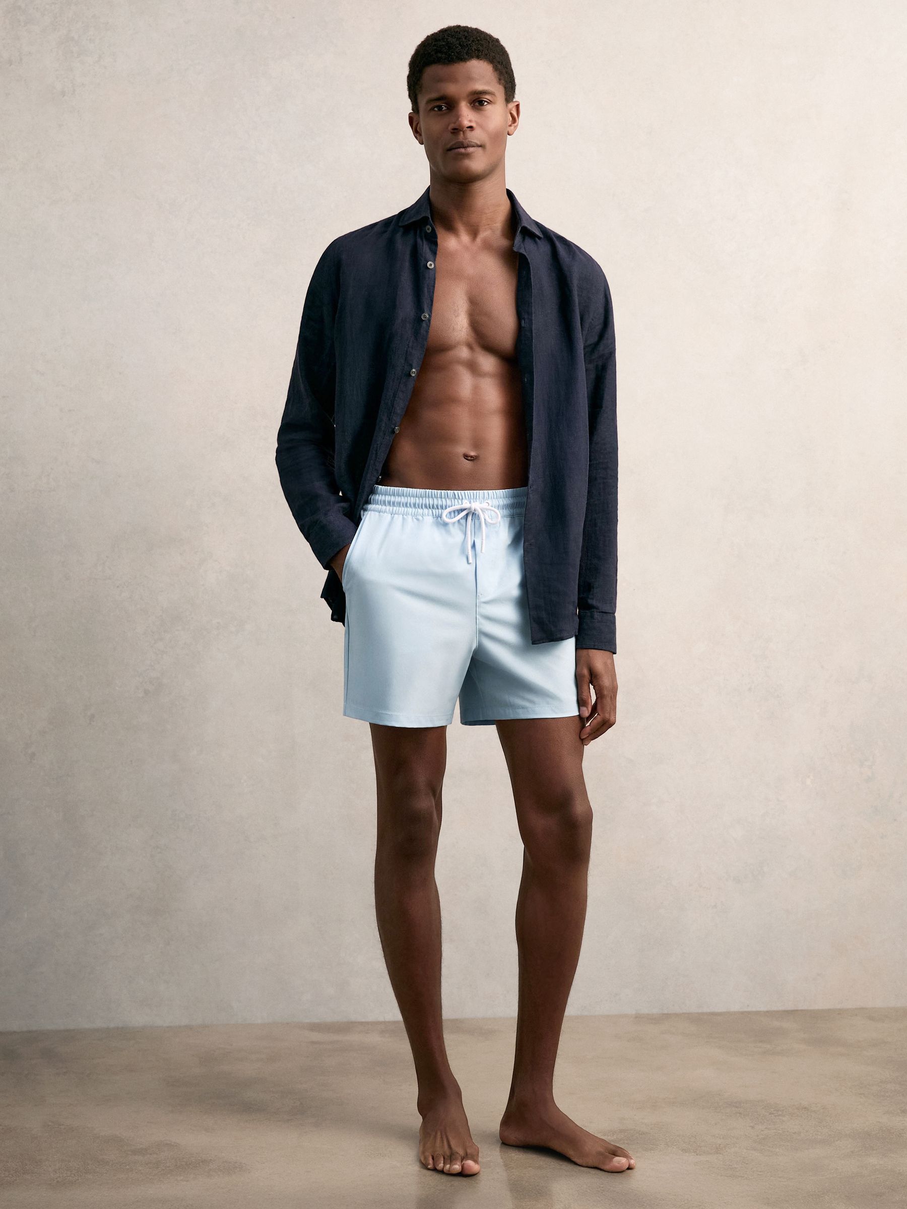 Drawstring Swim Shorts in Soft Blue - Image 1 of 8 Drawstring Swim Shorts in Soft Blue - Image 1 of 8