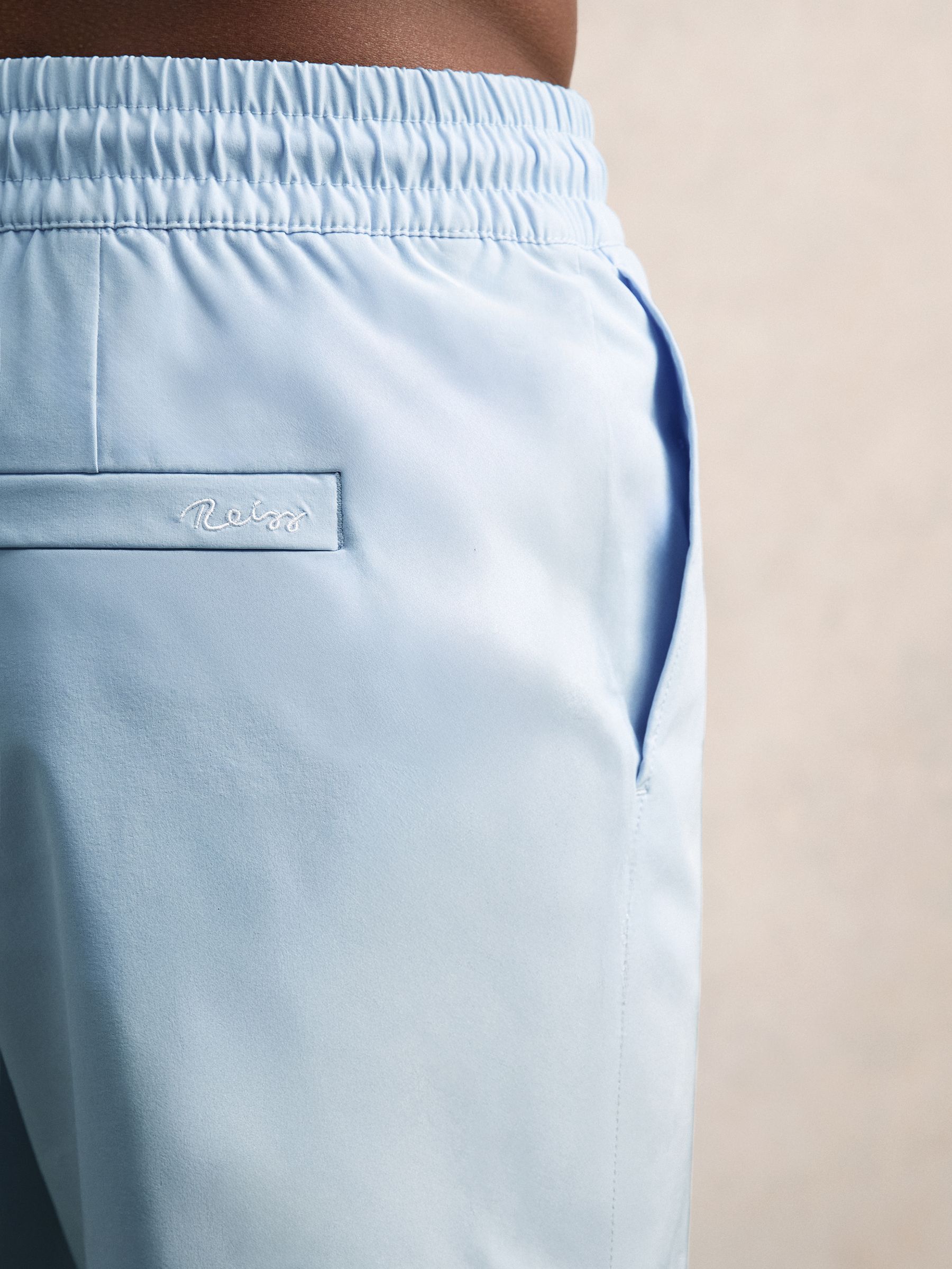 Drawstring Swim Shorts in Soft Blue - image 5
