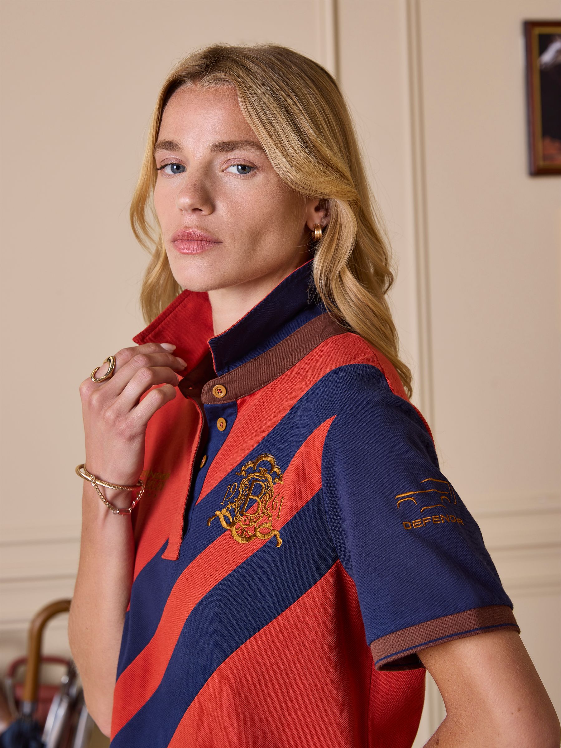 Official Burghley Orange Pique Polo Shirt | Joules