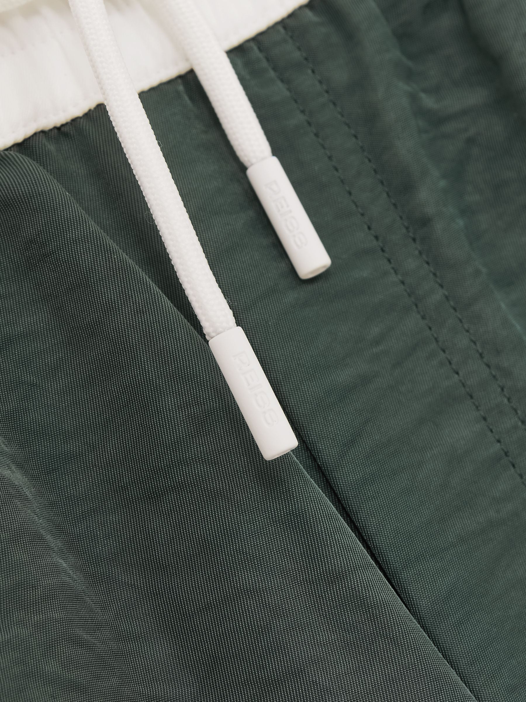 Colour-Block Piped-Trim Swim Shorts in Dark Green/White - Image 5 of 5