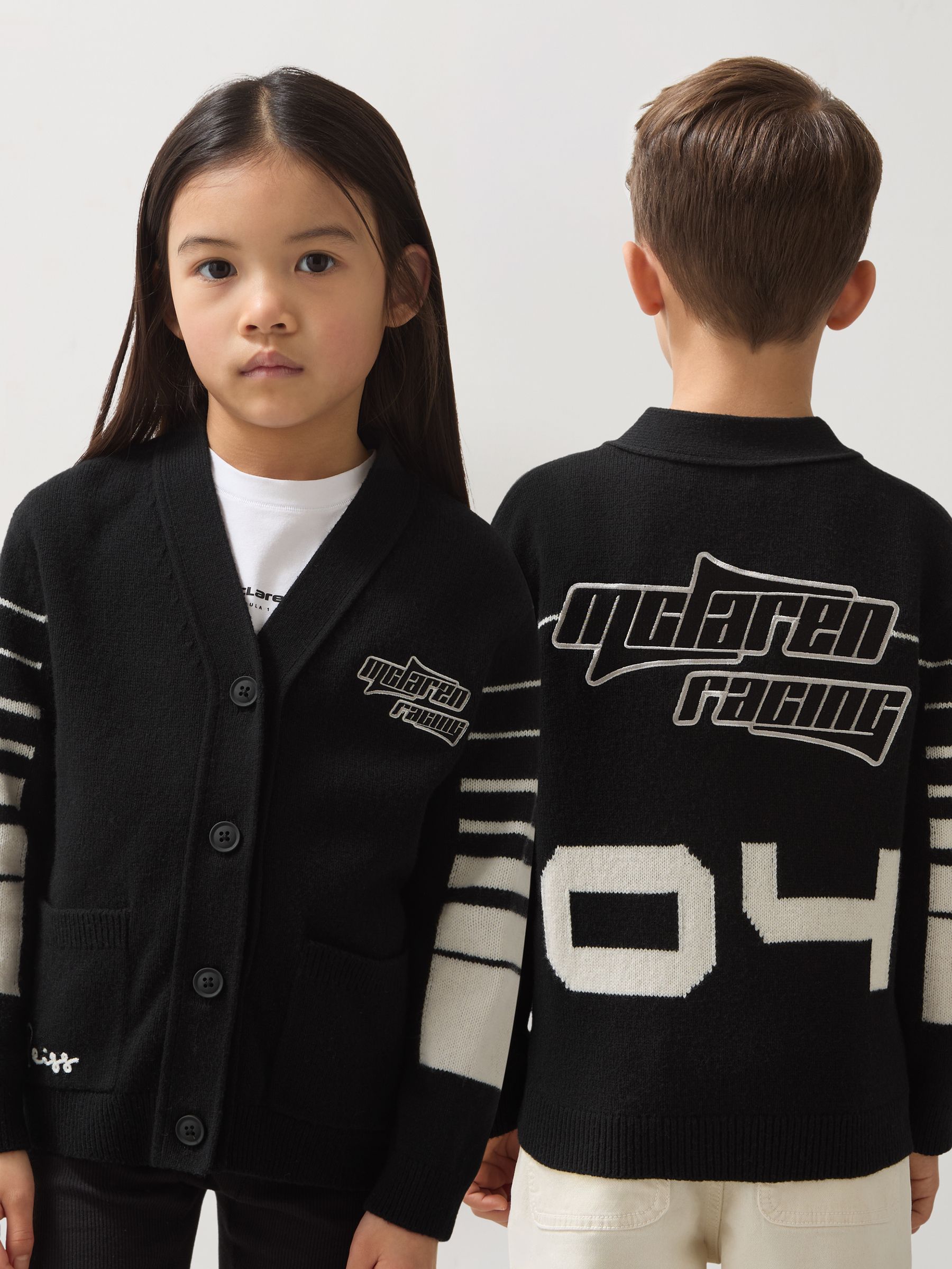 13-14 yrs Unisex Fit McLaren F1 Team Varsity Wool-Cashmere Cardigan in Black - Image 2 of 8 13-14 yrs Unisex Fit McLaren F1 Team Varsity Wool-Cashmere Cardigan in Black - Image 2 of 8