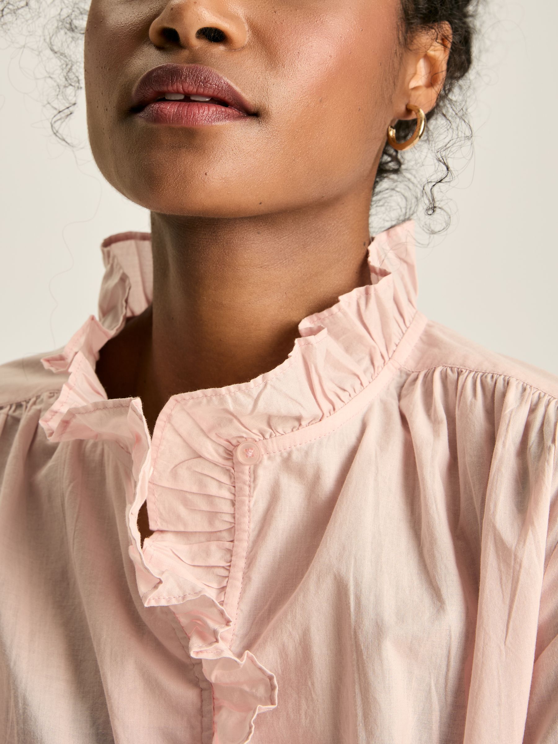 pink ruffle blouse