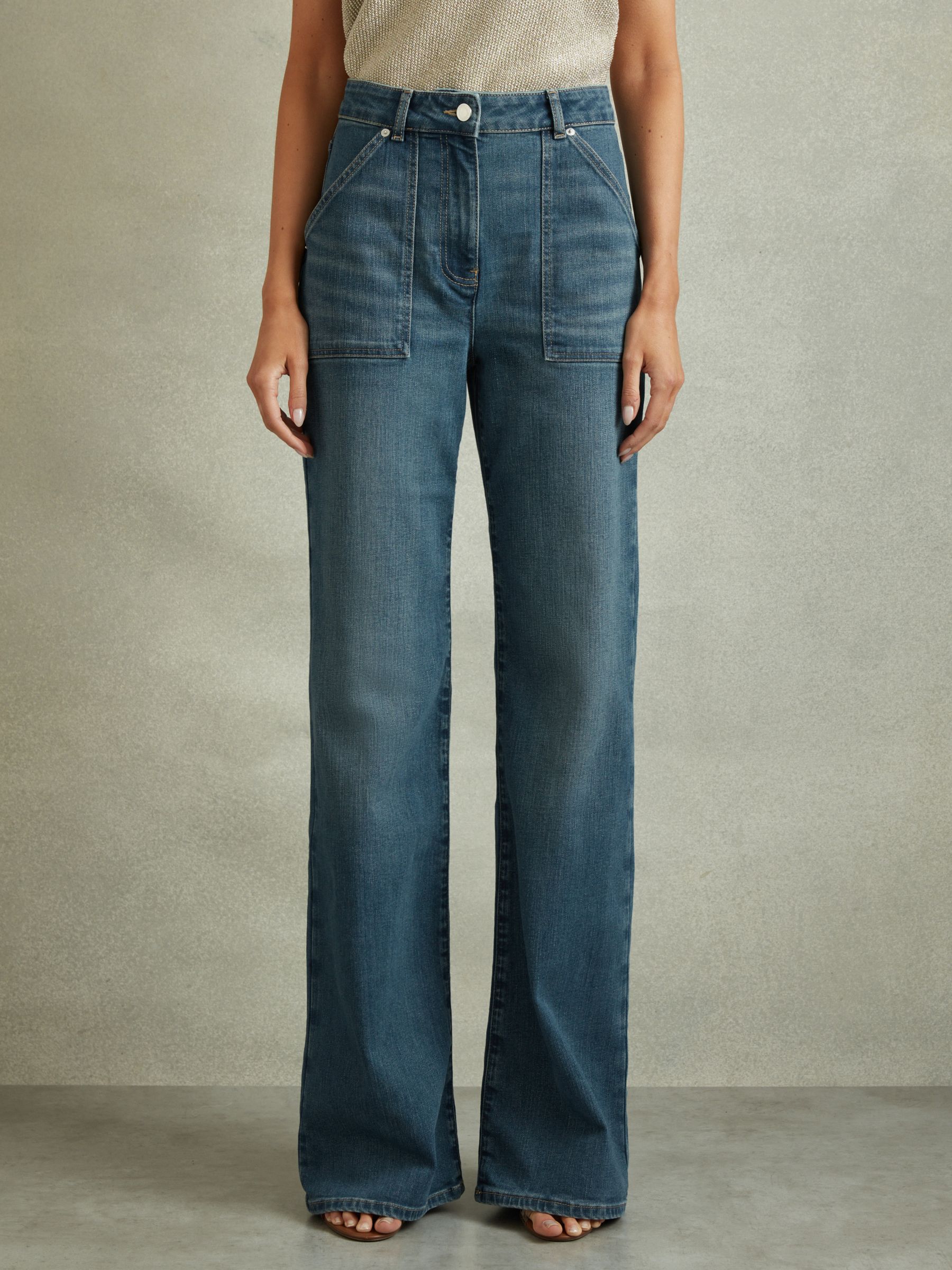 Petite Mid Rise Flared Utility Jeans in Mid Blue - Image 1 of 7