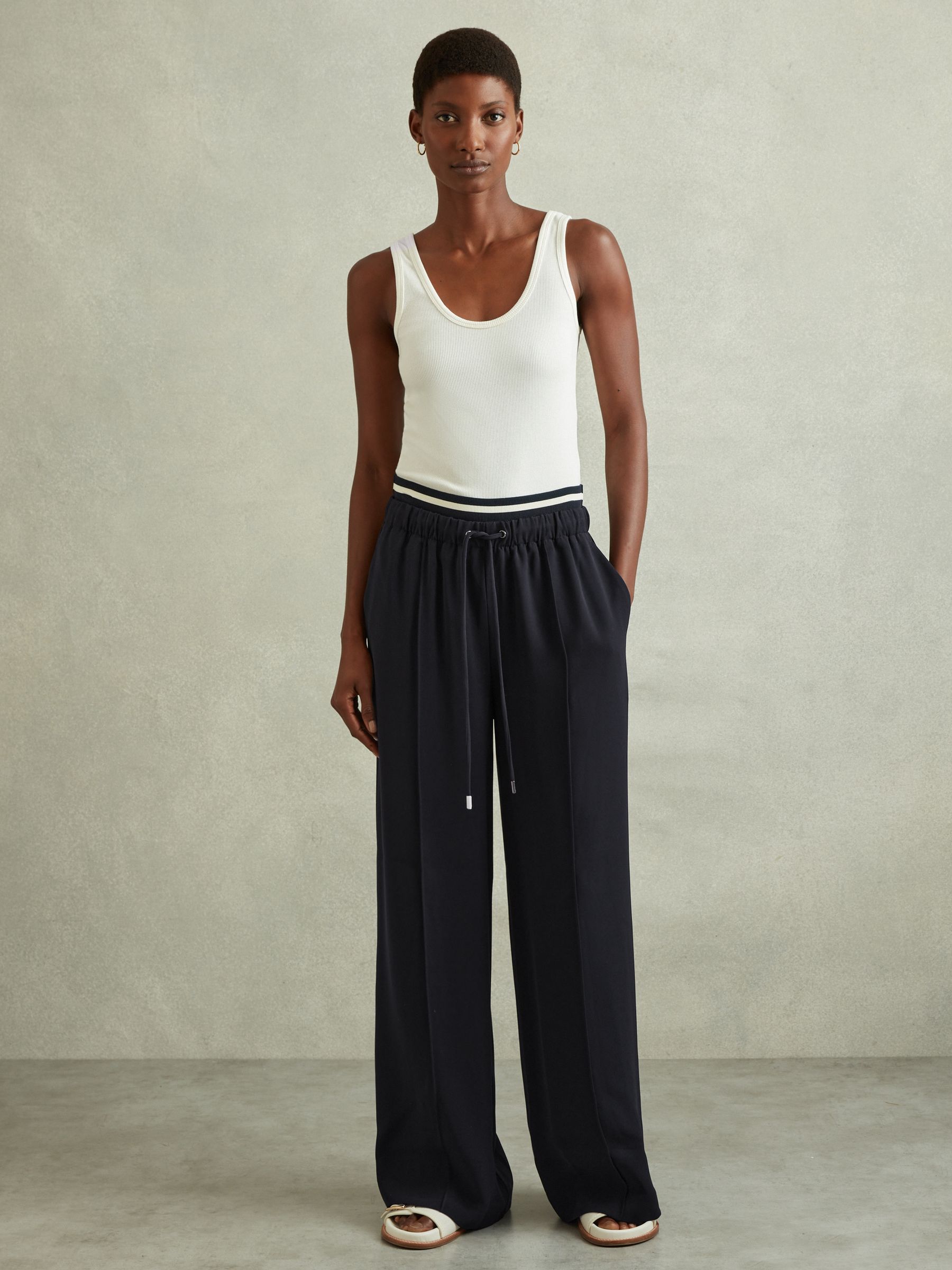 Petite Waistband Detail Wide Leg Trousers in Navy - Image 1 of 7 Petite Waistband Detail Wide Leg Trousers in Navy - Image 1 of 7
