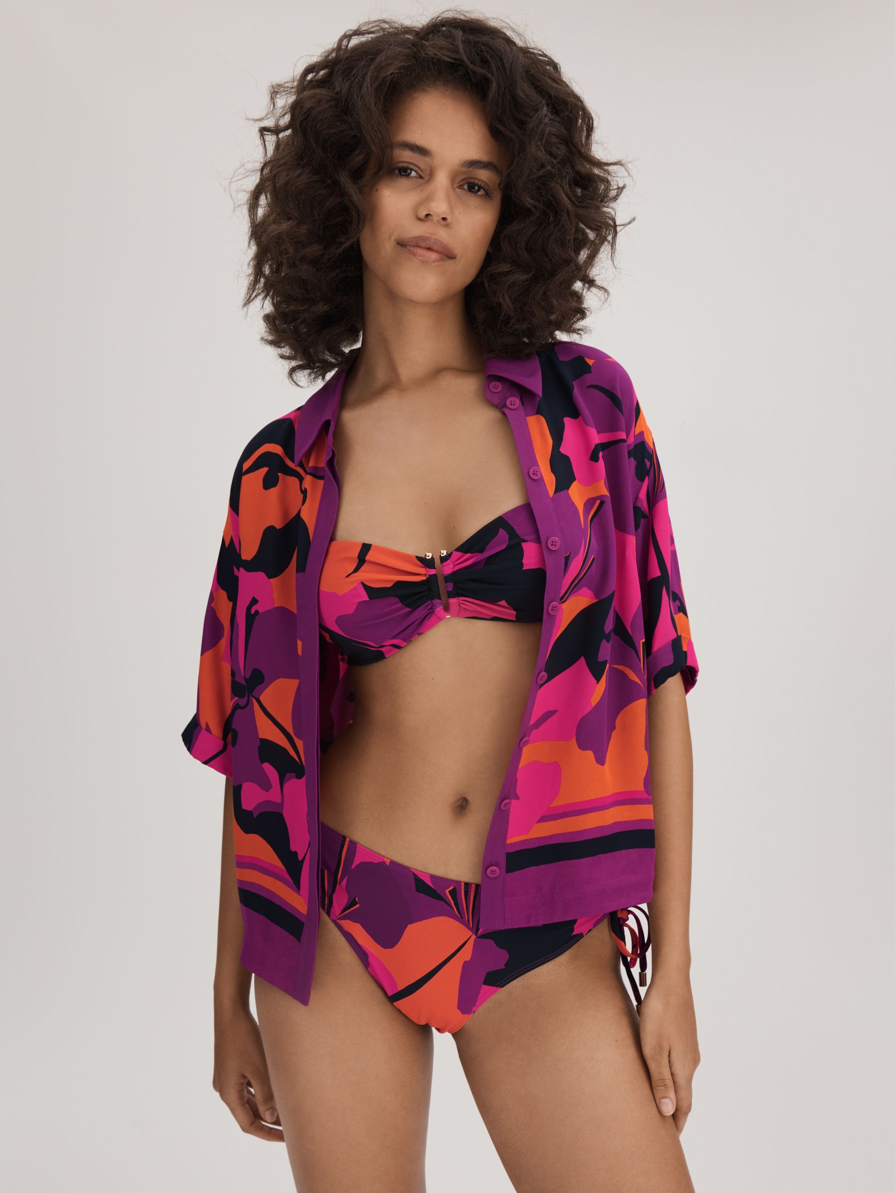 Florere Printed Ruched Bikini Bottoms in Pink/Orange - Image 1 of 4