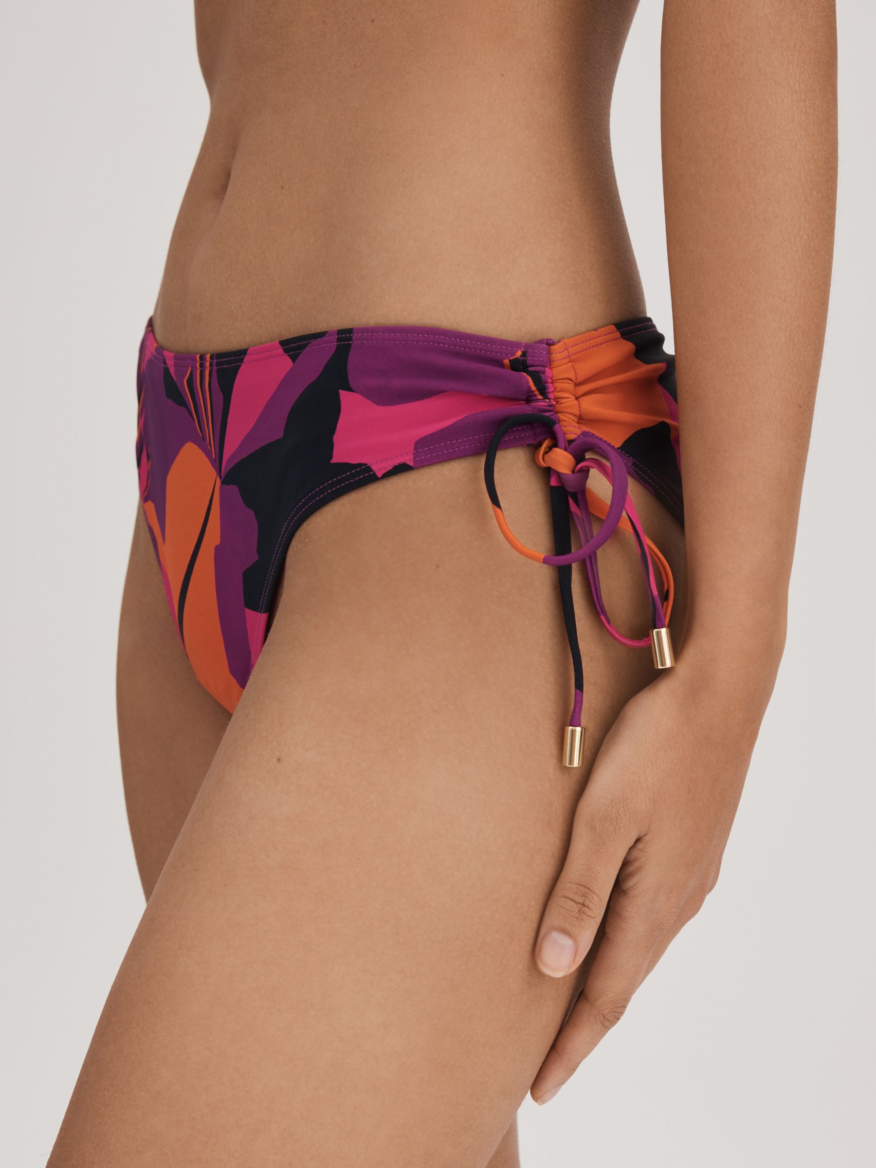 Florere Printed Ruched Bikini Bottoms in Pink/Orange - Image 3 of 4