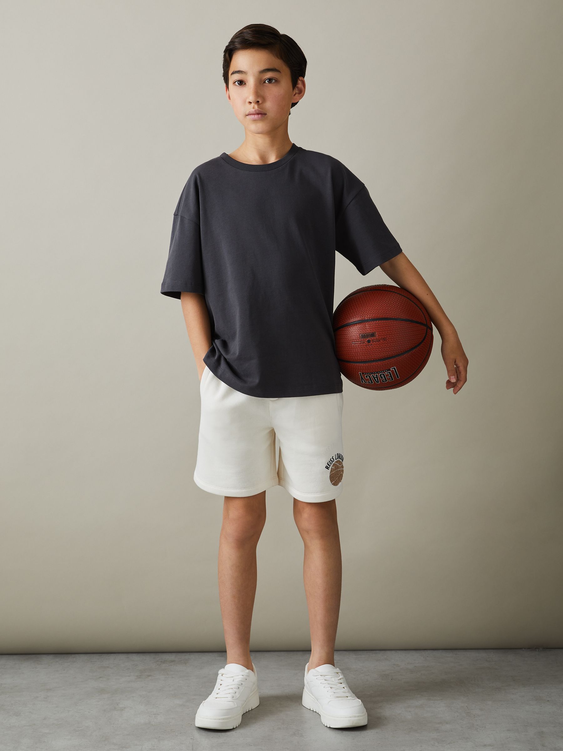 3-9 yrs Relaxed Embroidered Basketball Shorts in Off White - Image 1 of 4 3-9 yrs Relaxed Embroidered Basketball Shorts in Off White - Image 1 of 4