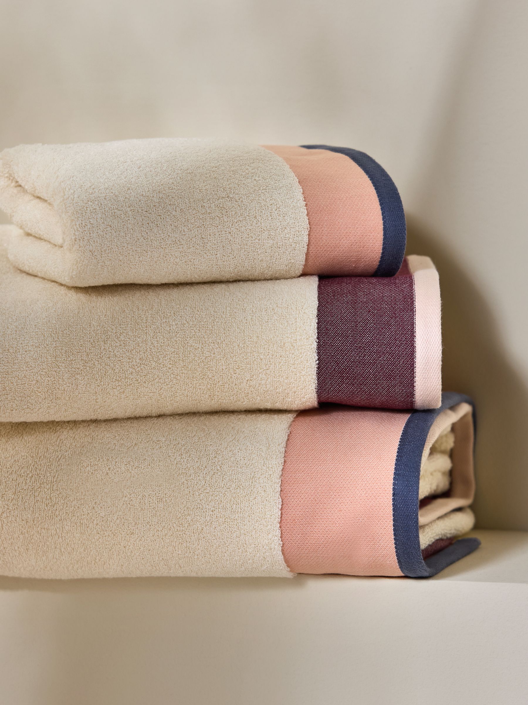 Dax Border Towel in Pinks - Image 1 of 3