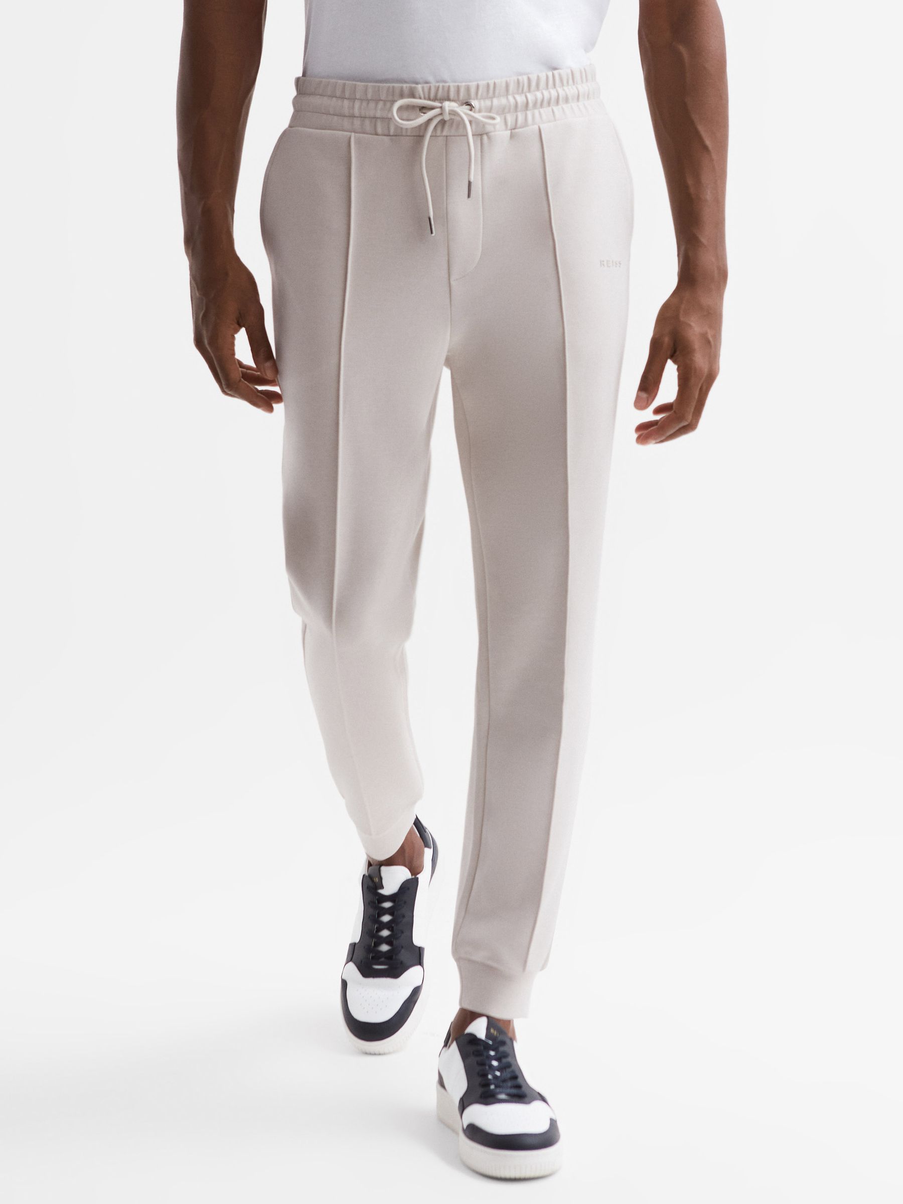 Interlock Drawstring Motif Joggers in Off White - Image 1 of 6 Interlock Drawstring Motif Joggers in Off White - Image 1 of 6