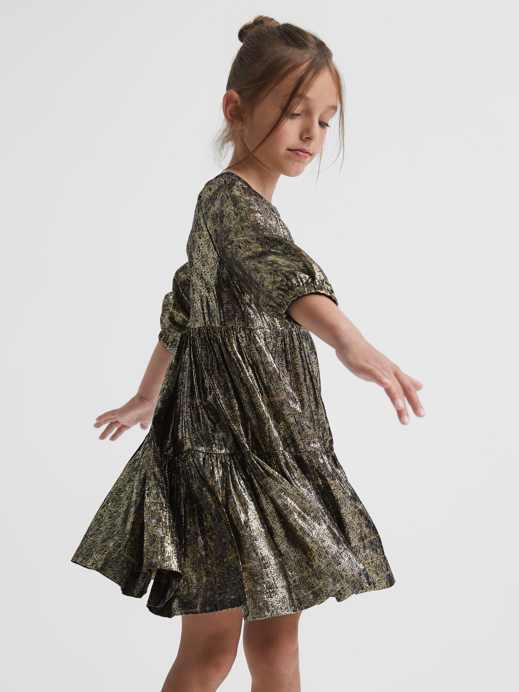 Junior Metallic Tiered Smock Dress in Gold - Image 1 of 8 Junior Metallic Tiered Smock Dress in Gold - Image 1 of 8