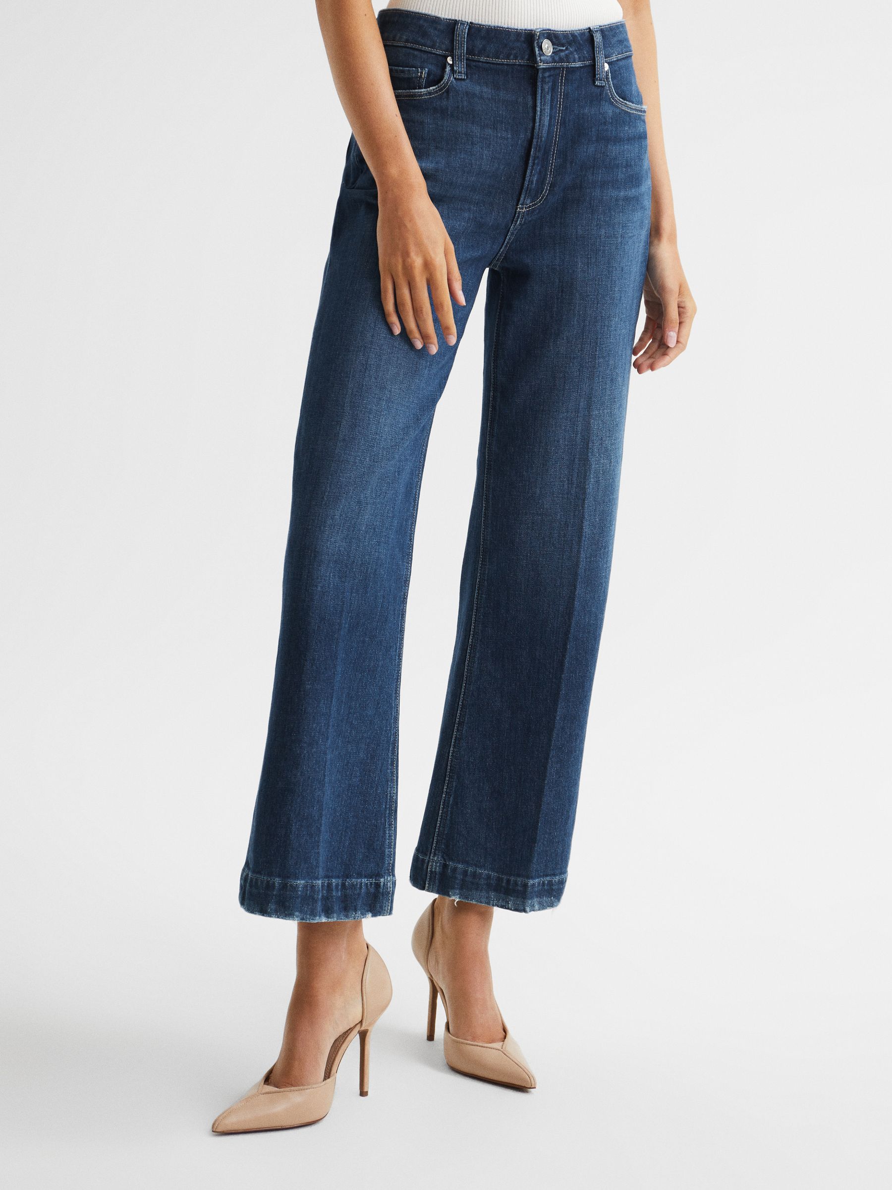 PAIGE High Rise Crop Flared Jeans in Dark Blue - Image 1 of 8 PAIGE High Rise Crop Flared Jeans in Dark Blue - Image 1 of 8