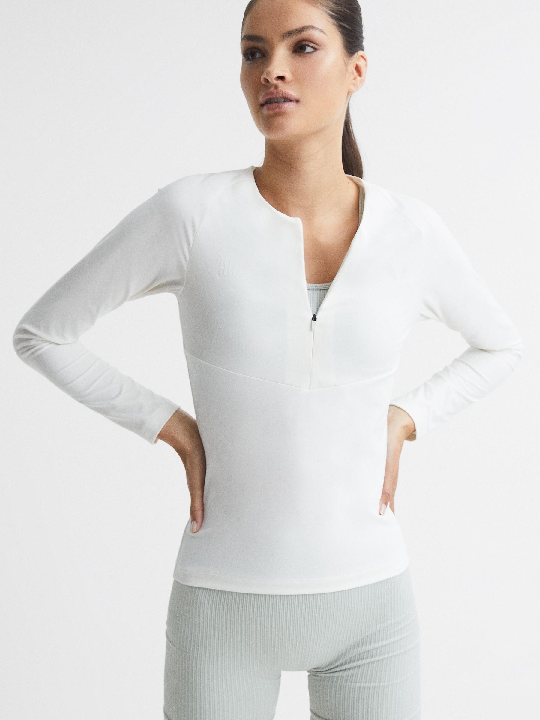 Castore Half Zip Performance Top in White - Image 1 of 7 Castore Half Zip Performance Top in White - Image 1 of 7