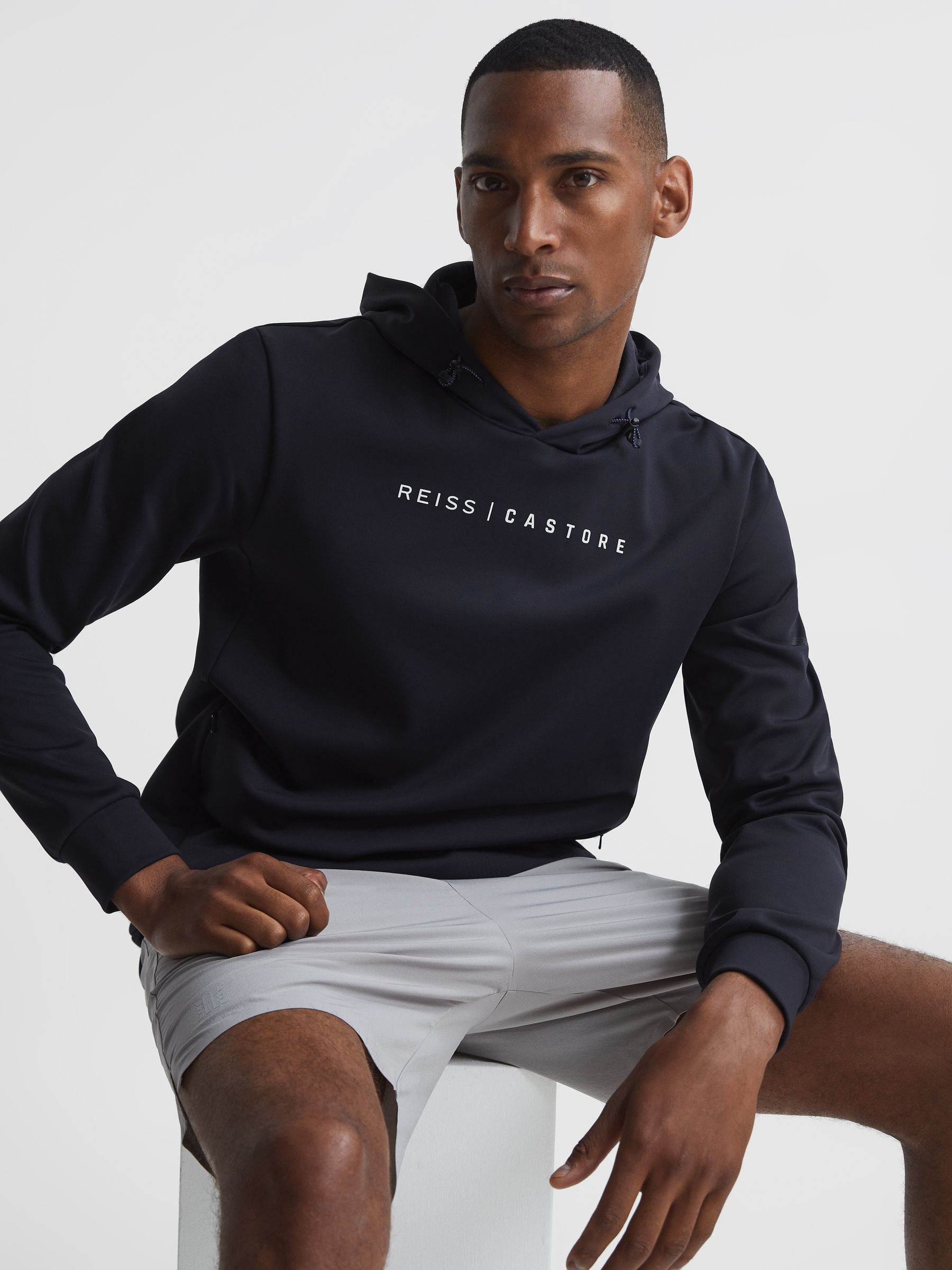 Castore Weatherproof Hoodie in Navy - Image 1 of 8 Castore Weatherproof Hoodie in Navy - Image 1 of 8