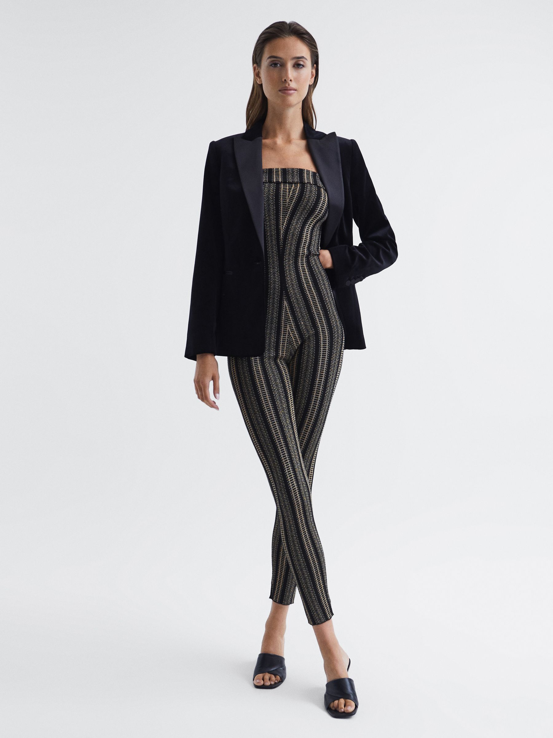 Knitted Metallic Jumpsuit in Black/Gold - Image 1 of 7 Knitted Metallic Jumpsuit in Black/Gold - Image 1 of 7