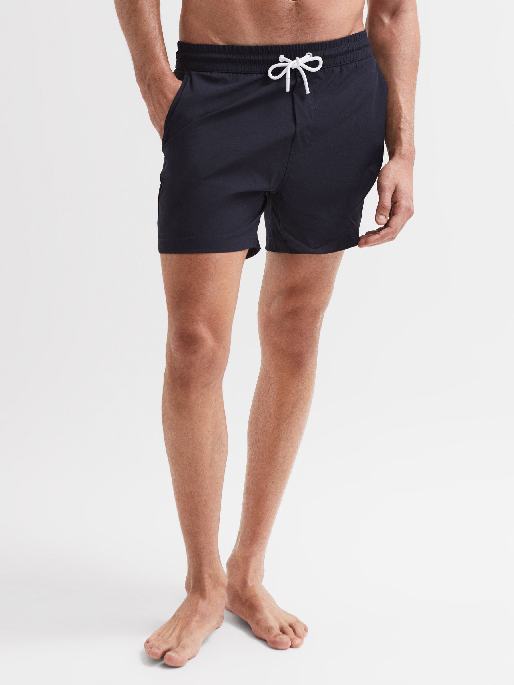 Plain Drawstring Swim Shorts in Navy - Image 1 of 7 Plain Drawstring Swim Shorts in Navy - Image 1 of 7