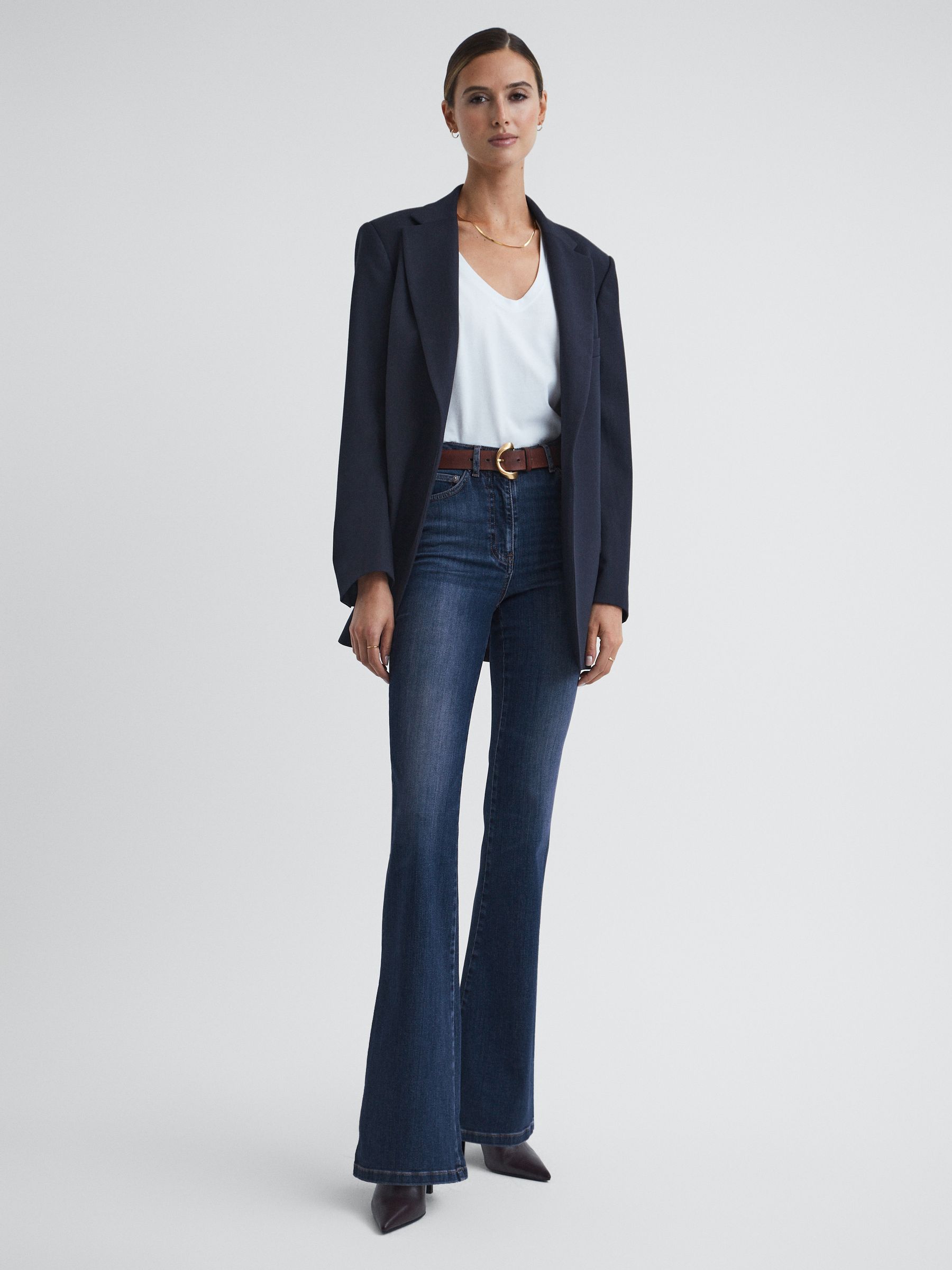 Petite High Rise Flared Jeans in Mid Blue - Image 1 of 6