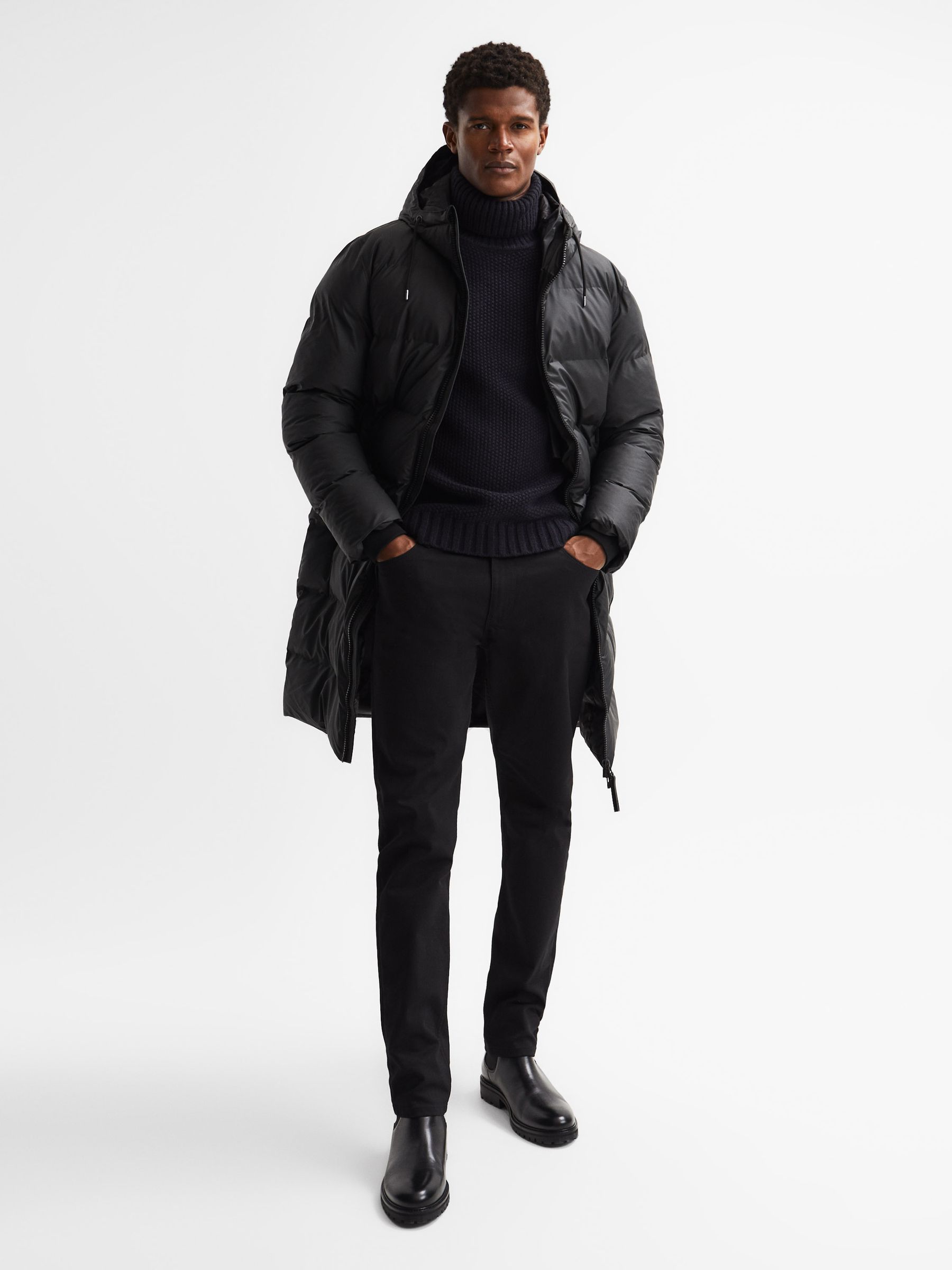 Rains Unisex Hooded Puffer Jacket in Black - Image 1 of 6