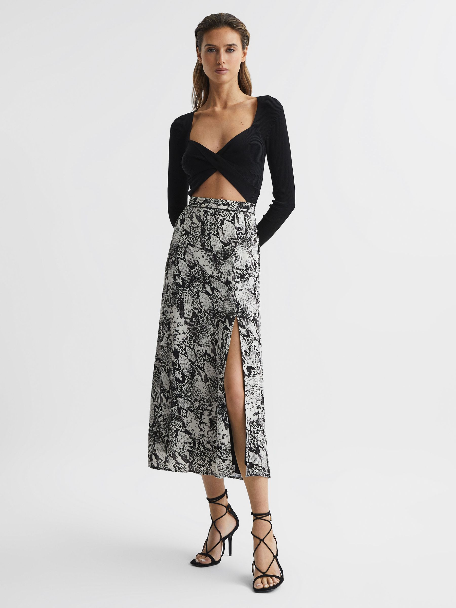 Reiss Printed Slip Midi Skirt in Black - REISS