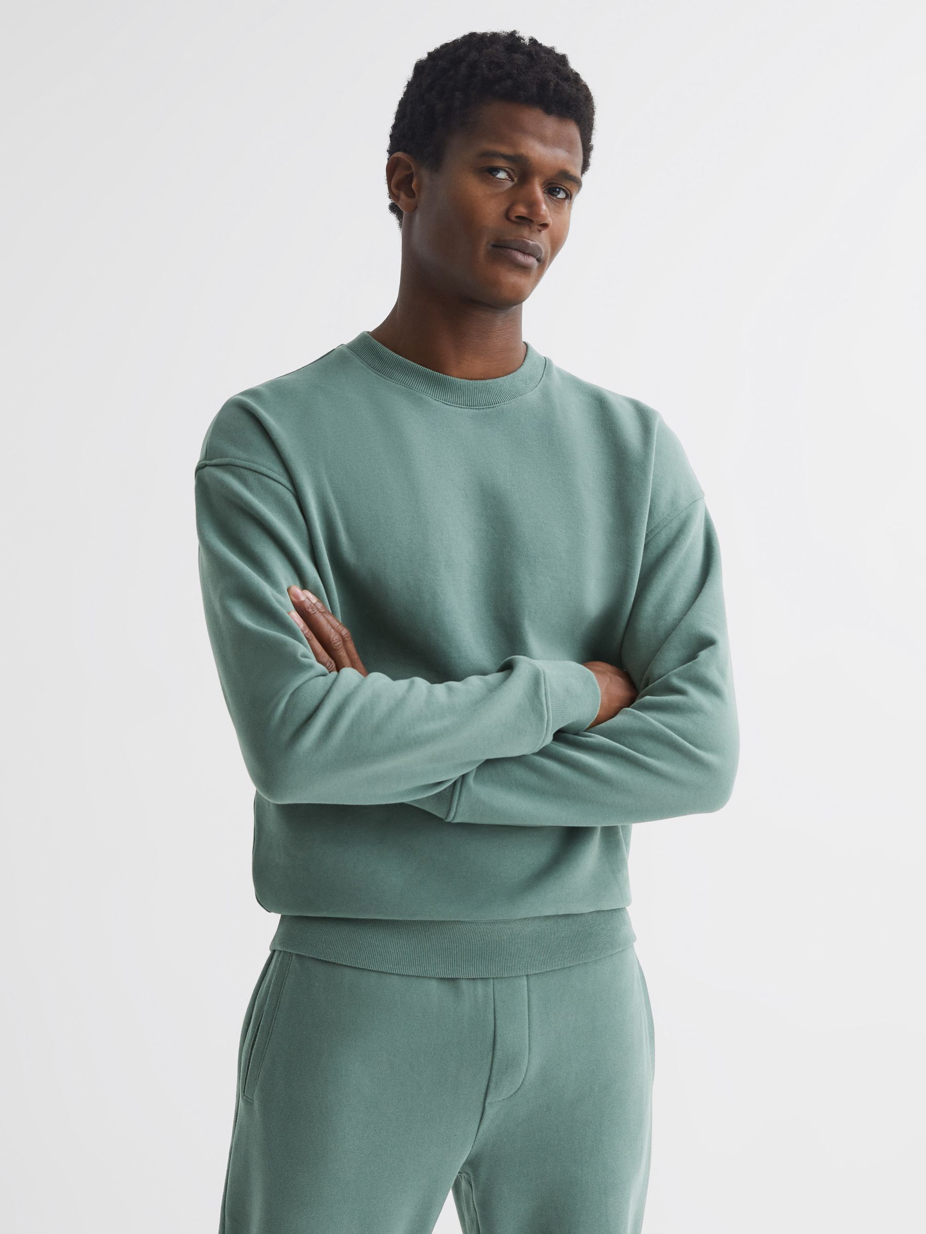 Oversized Garment Dye Sweatshirt in Fern Green - Image 1 of 6