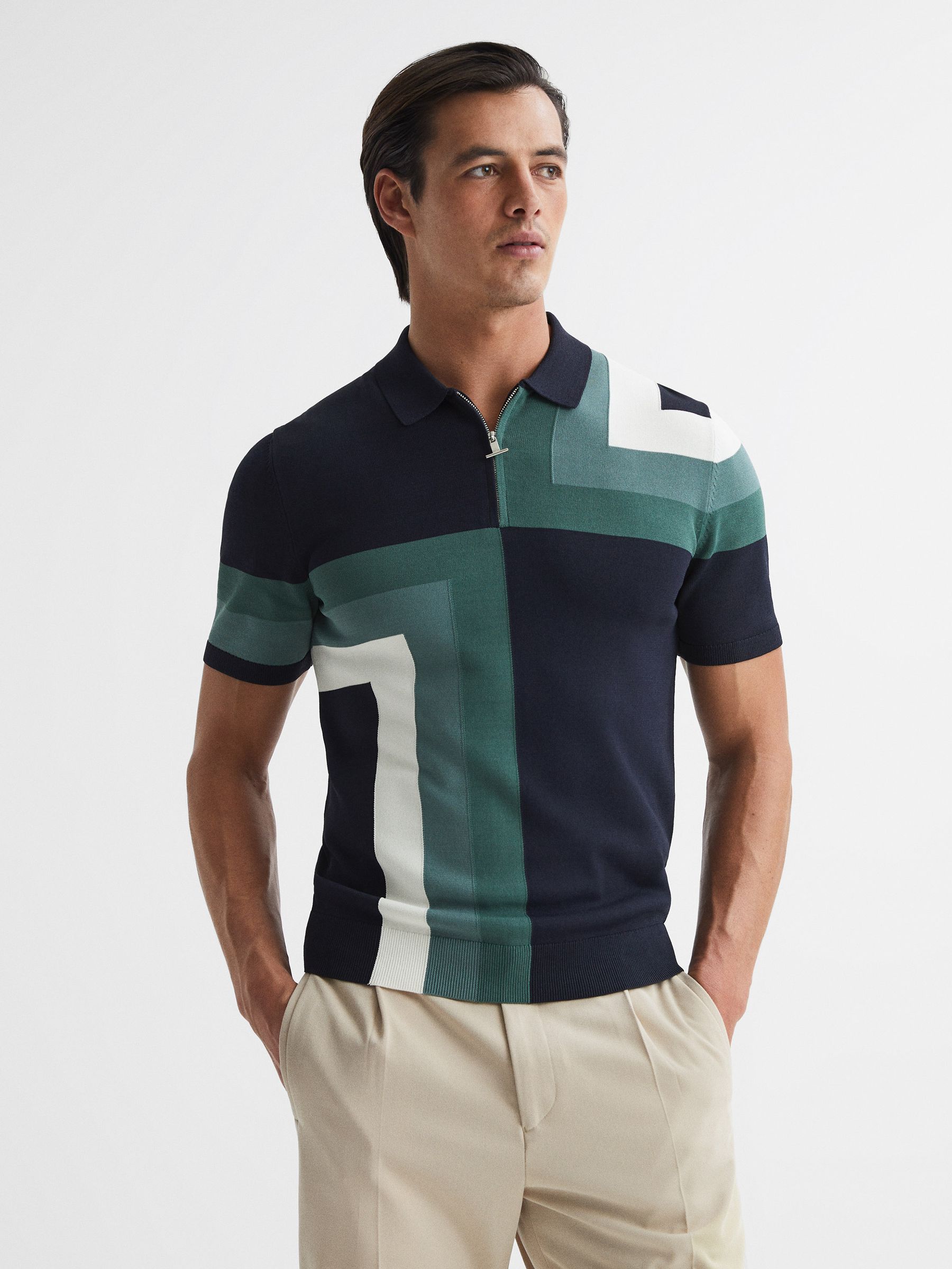 Slim Fit Short Sleeve Half Zip Colourblock Polo Shirt in Navy - Image 1 of 7 Slim Fit Short Sleeve Half Zip Colourblock Polo Shirt in Navy - Image 1 of 7