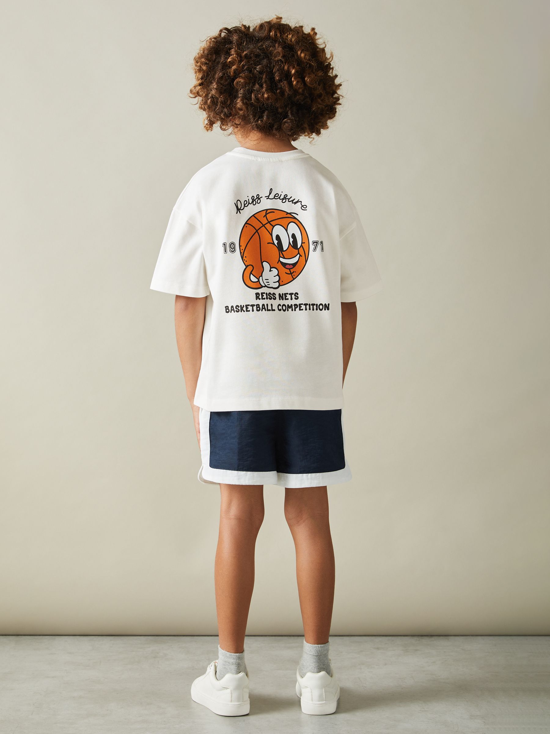 3-9 yrs Oversized Cotton Basketball Motif Crew Neck T-Shirt in Off White - Image 1 of 5 3-9 yrs Oversized Cotton Basketball Motif Crew Neck T-Shirt in Off White - Image 1 of 5
