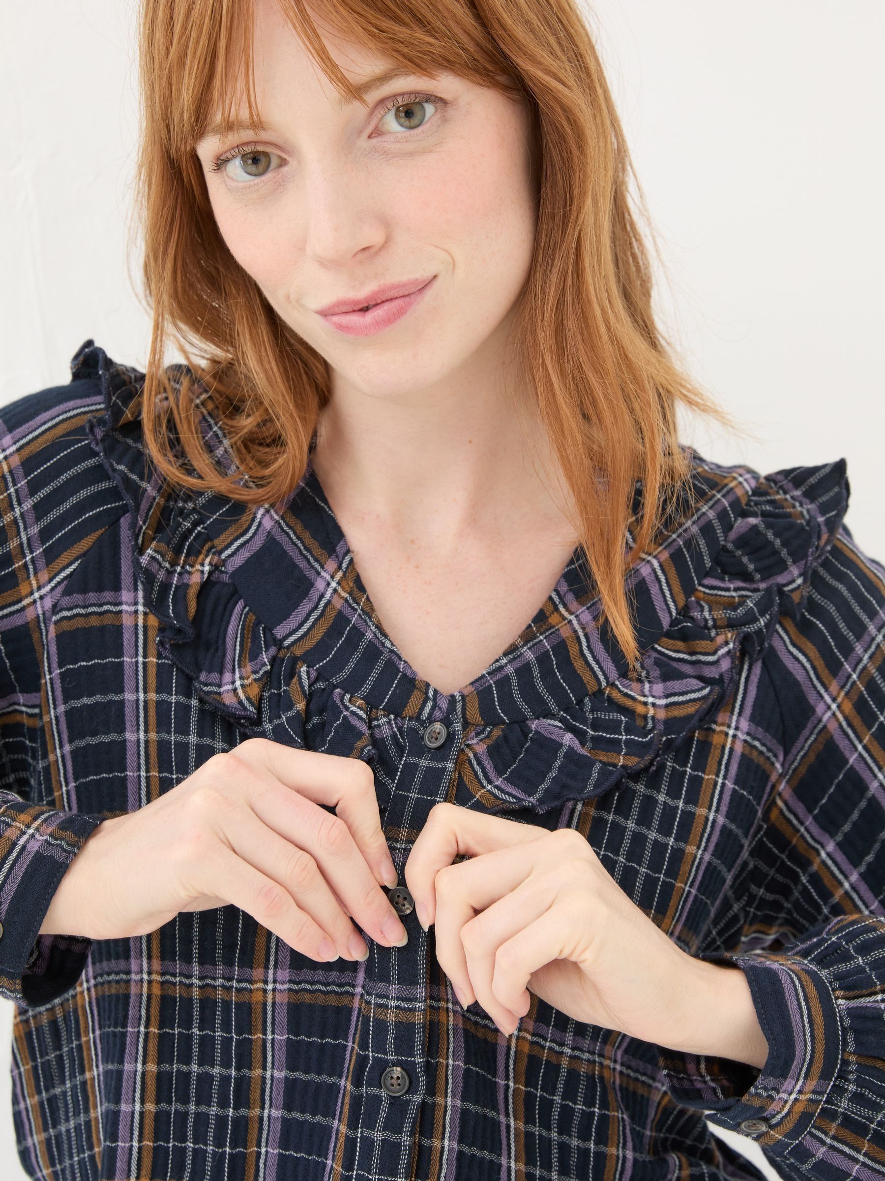 navy blue ruffle blouse