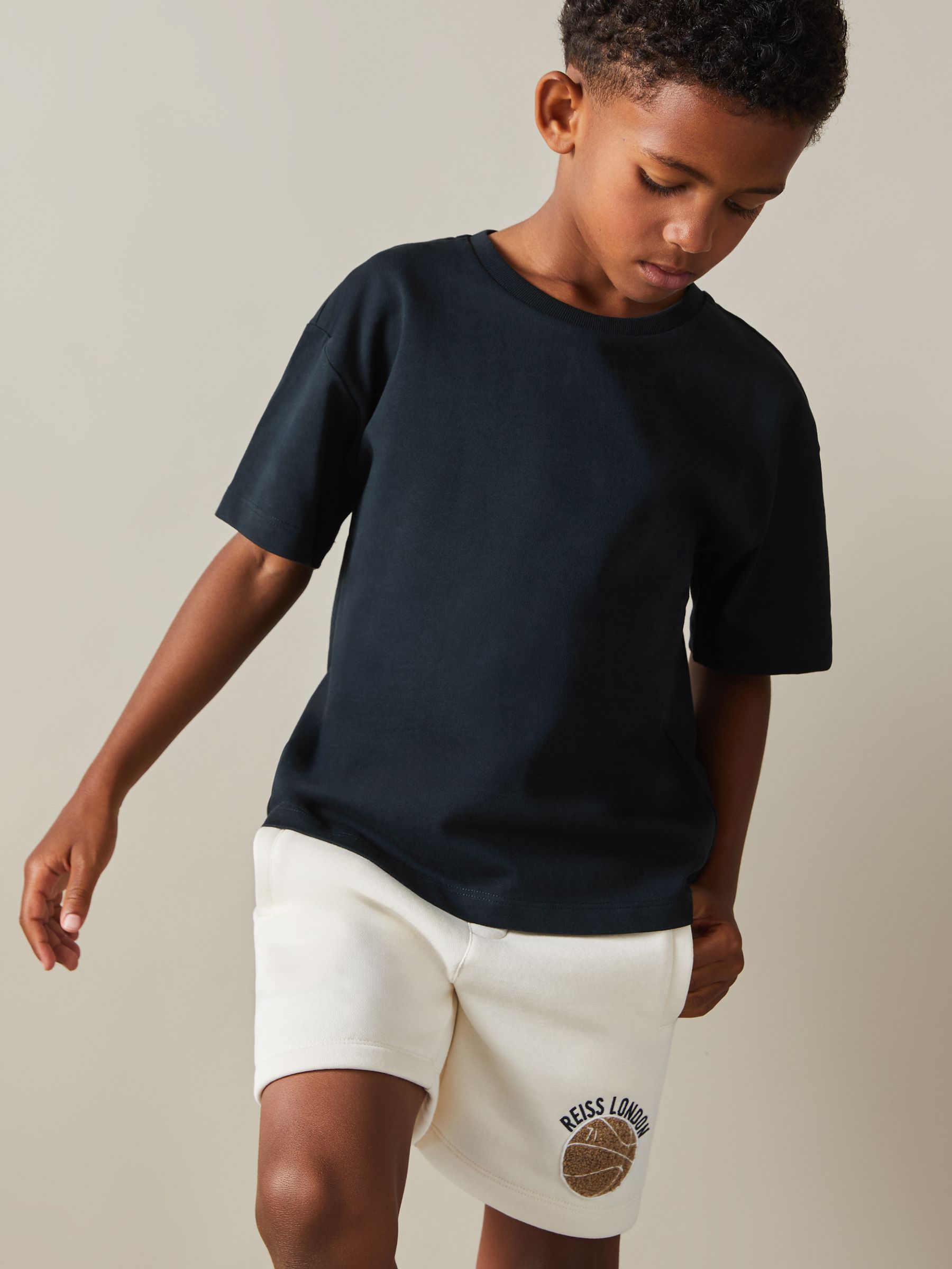 9-13 yrs Oversized Cotton Crew Neck T-Shirt in Washed Navy - Image 1 of 4