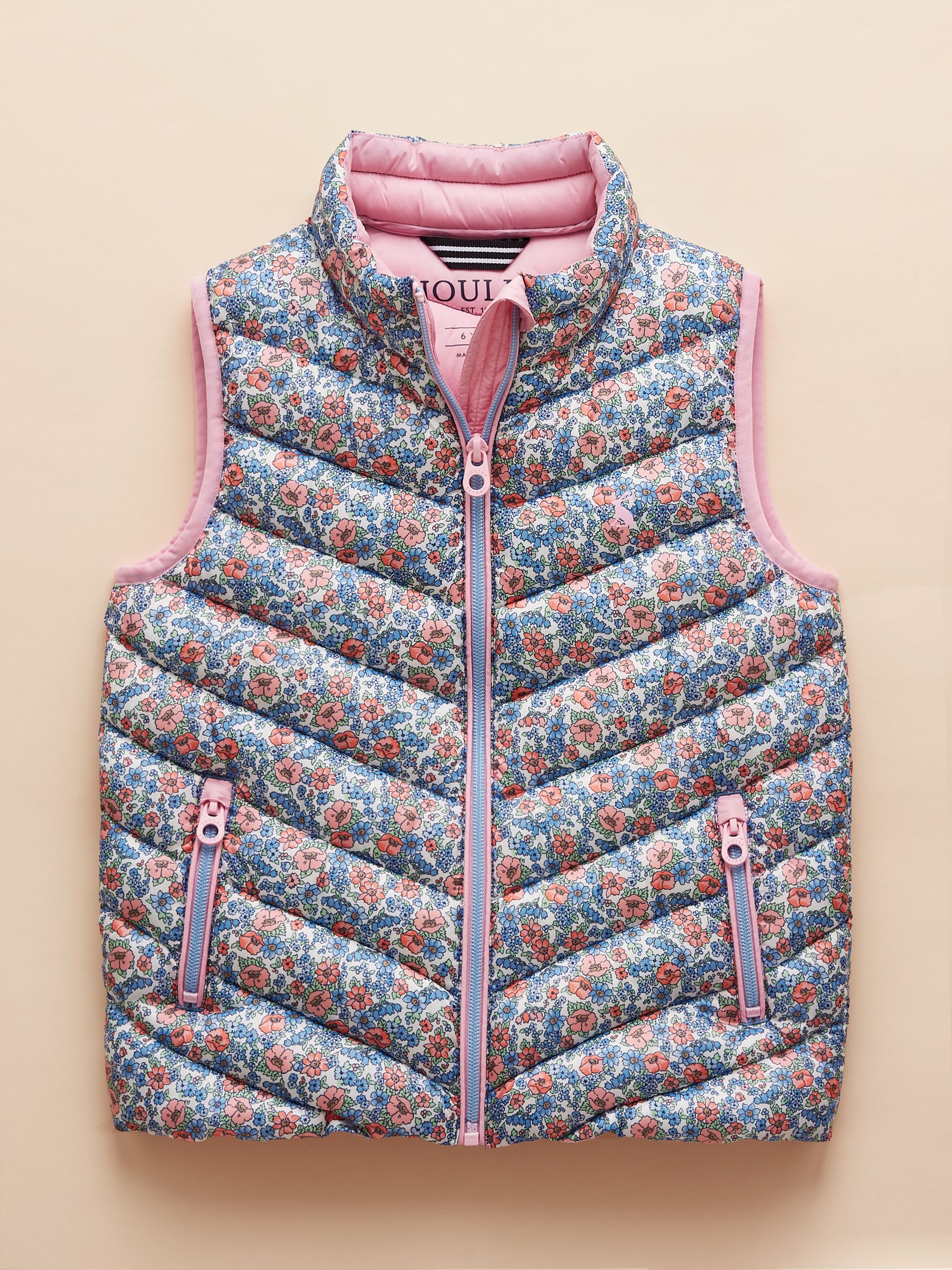 Girls' Crofton Gilet Pink Ditsy Showerproof Padded Gilet - Image 1 of 5 Girls' Crofton Gilet Pink Ditsy Showerproof Padded Gilet - Image 1 of 5