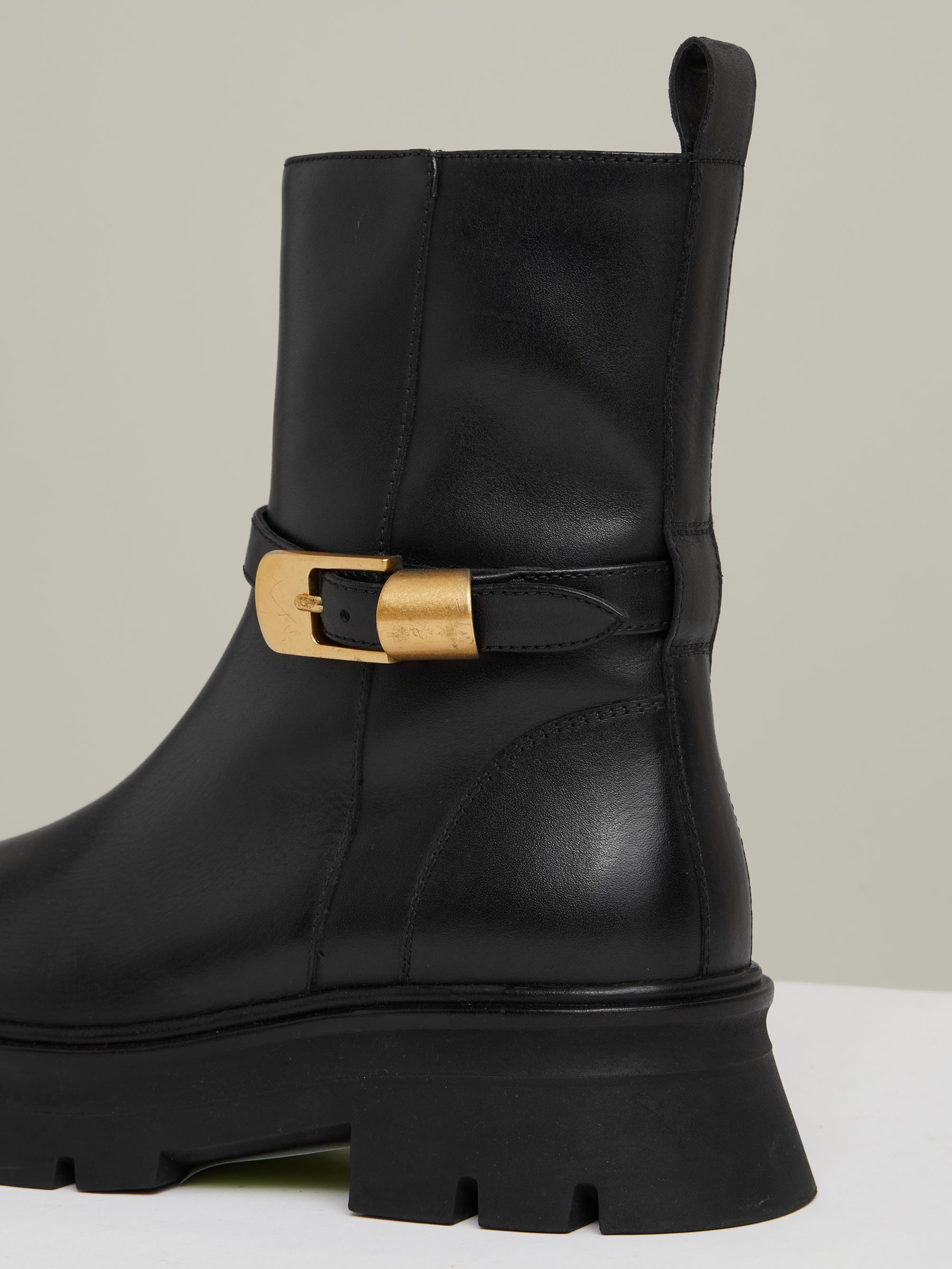 Leather Cleated Ankle Boots in Black - image 3