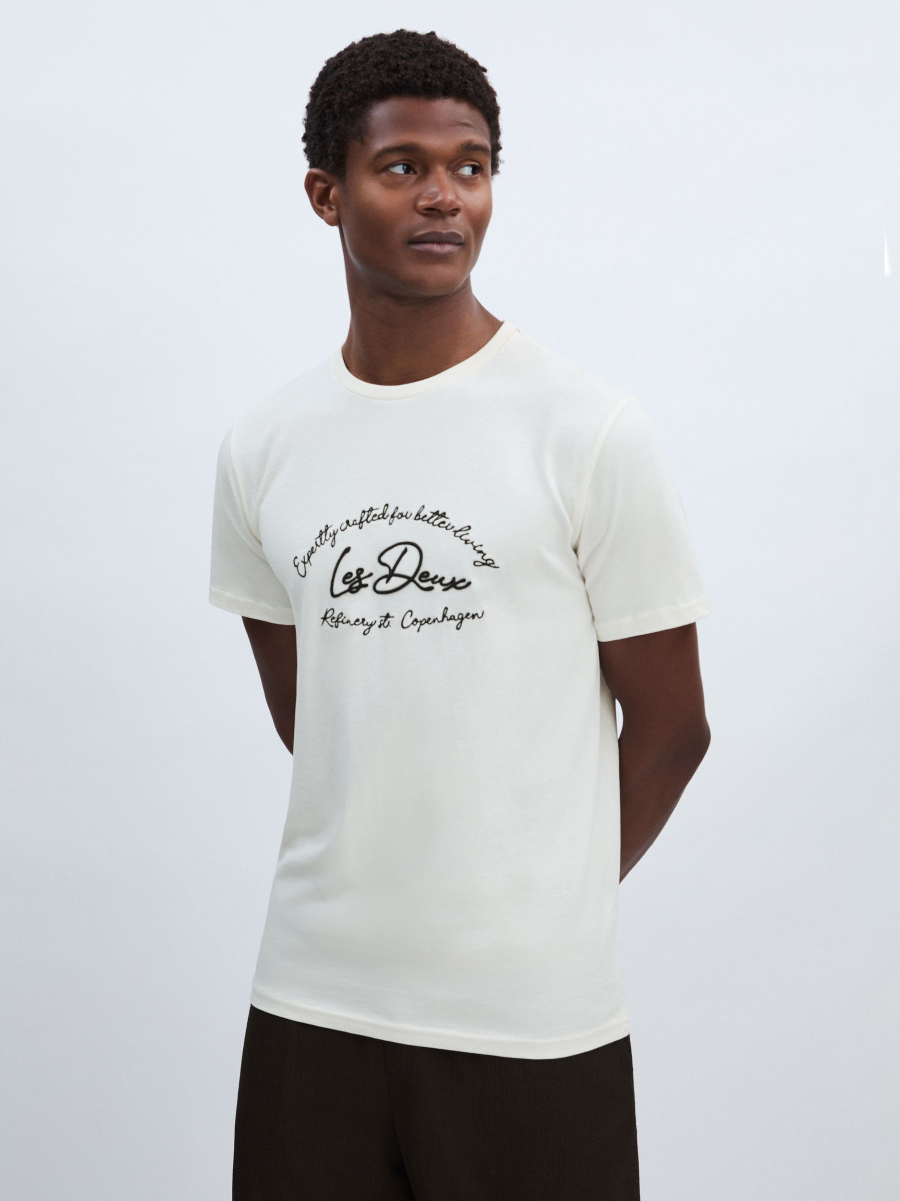 Embroidered Logo 100% Cotton T-Shirt in Ivory/Black - Image 1 of 6 Embroidered Logo 100% Cotton T-Shirt in Ivory/Black - Image 1 of 6