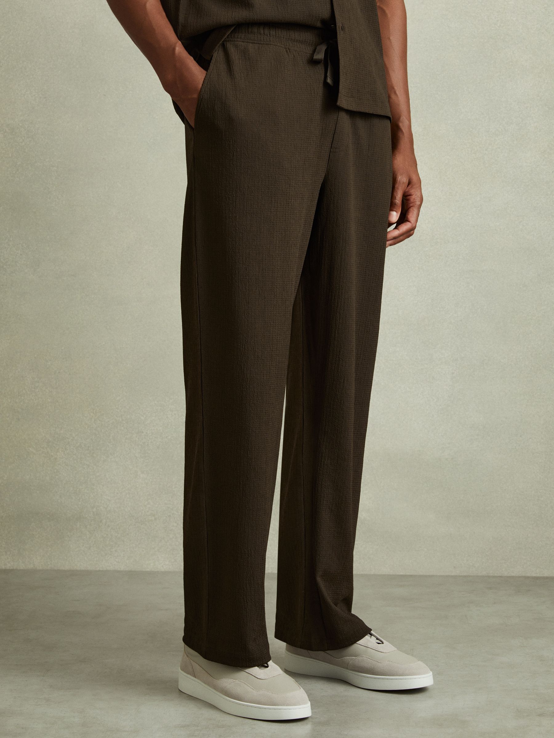 Textured Crepe Drawstring Trousers in Dark Olive Green - Image 1 of 6