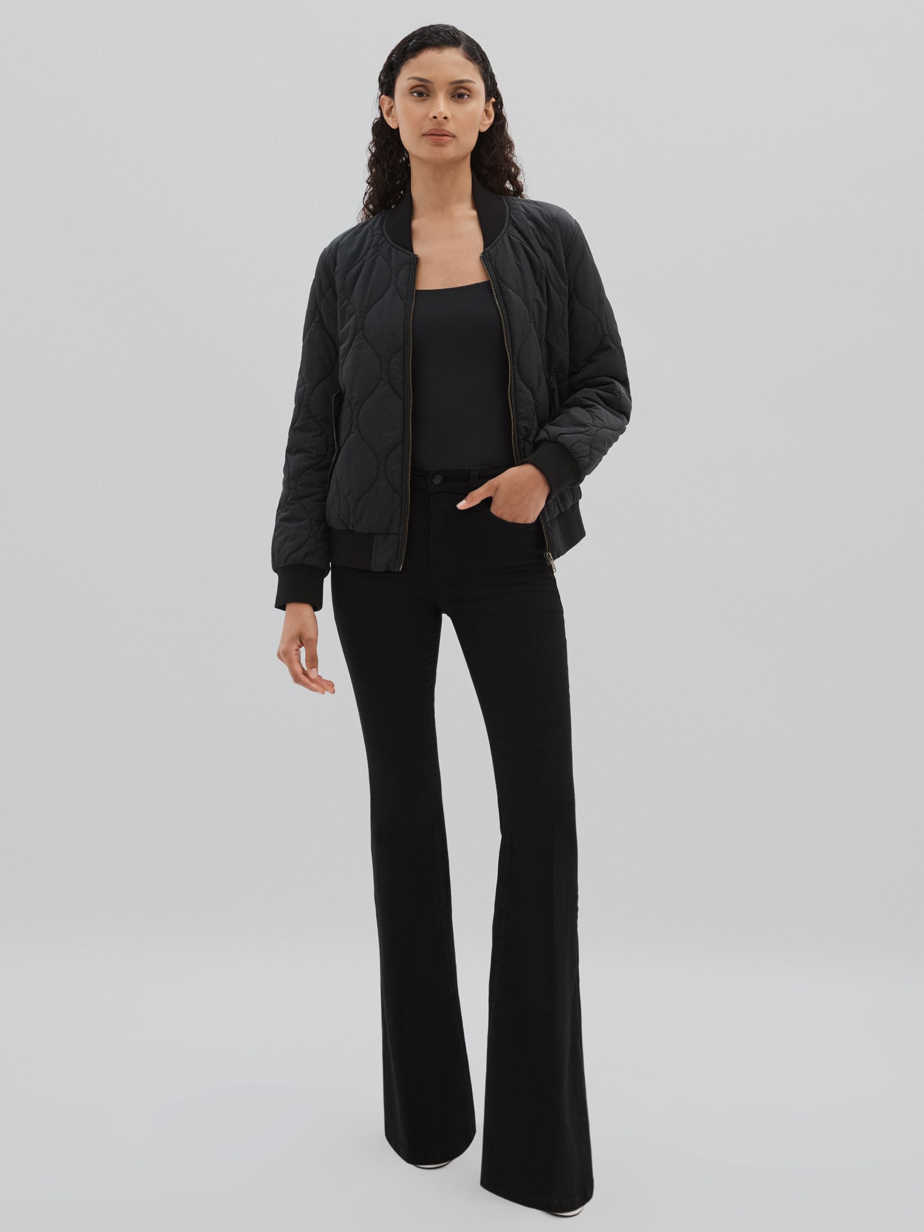 Good American Flared Jeans in Black - Image 1 of 6