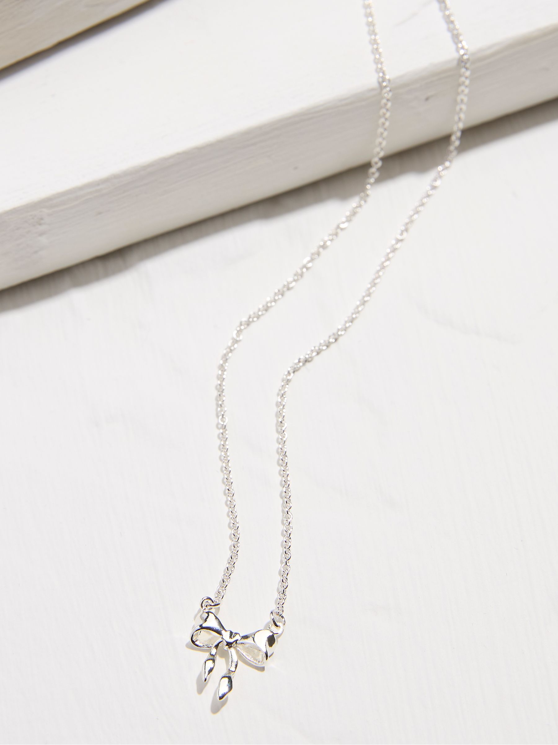 Silver Tone Bow Necklace - Image 2 of 2