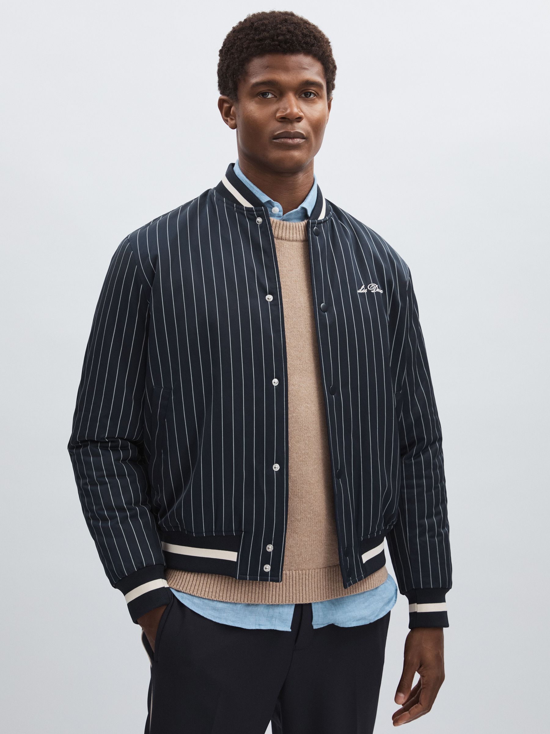 Les Deux Technical Varsity Jacket in Navy Stripe - Image 1 of 5 Les Deux Technical Varsity Jacket in Navy Stripe - Image 1 of 5