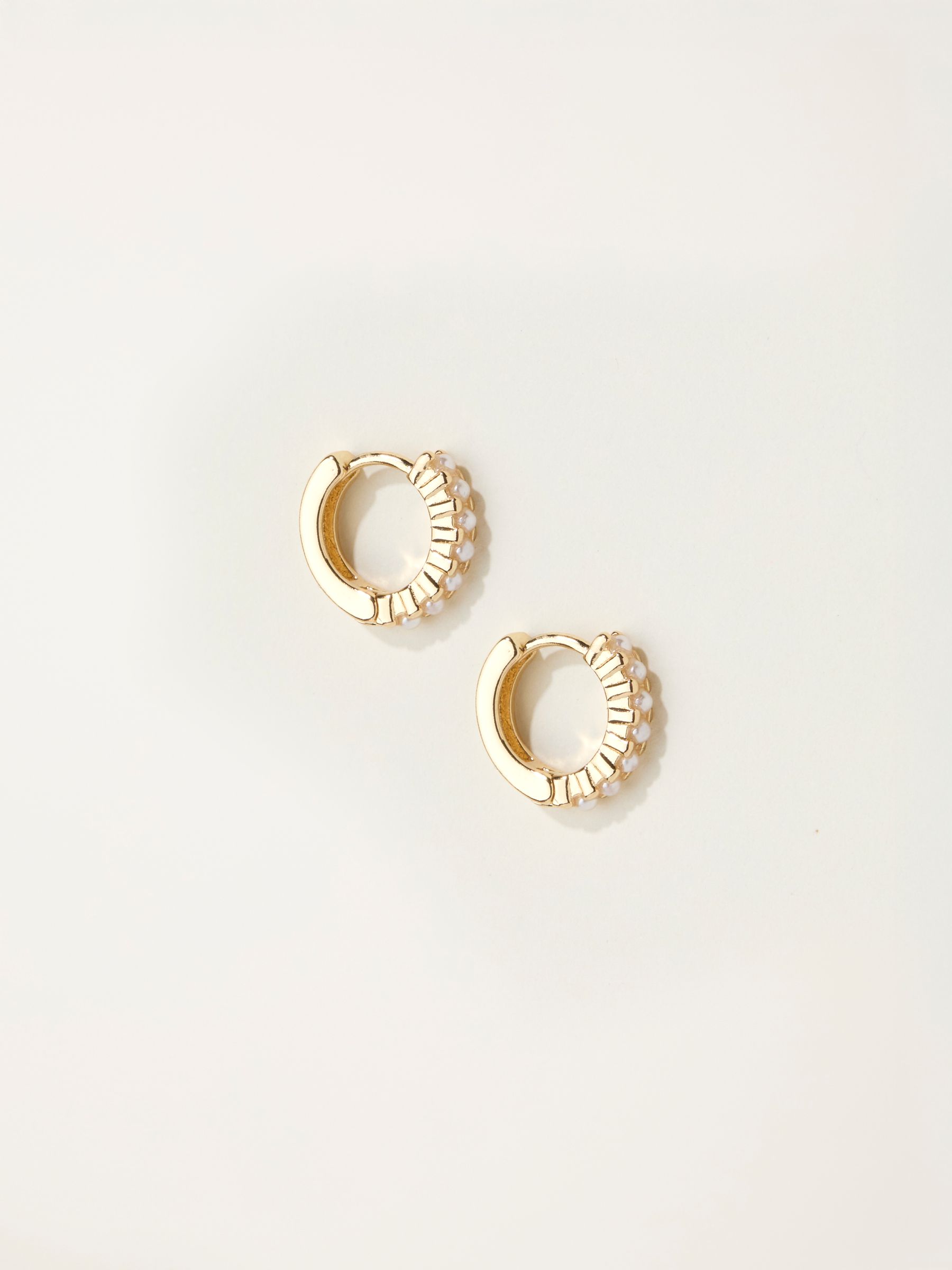 Gold Tone Pearl Huggie Earrings - Image 1 of 2
