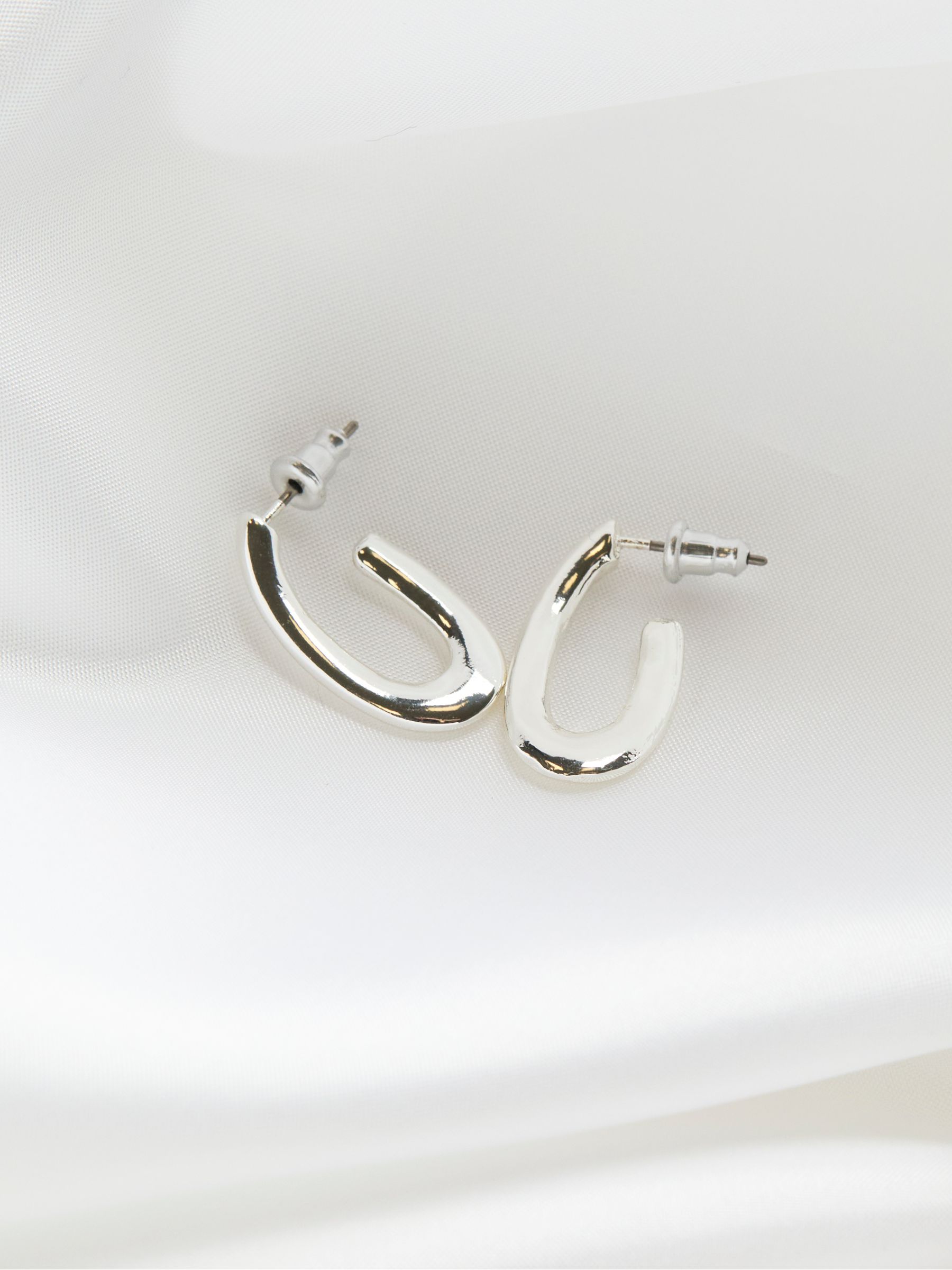 Silver Tone Twist Oval Hoop Earrings - Image 2 of 2