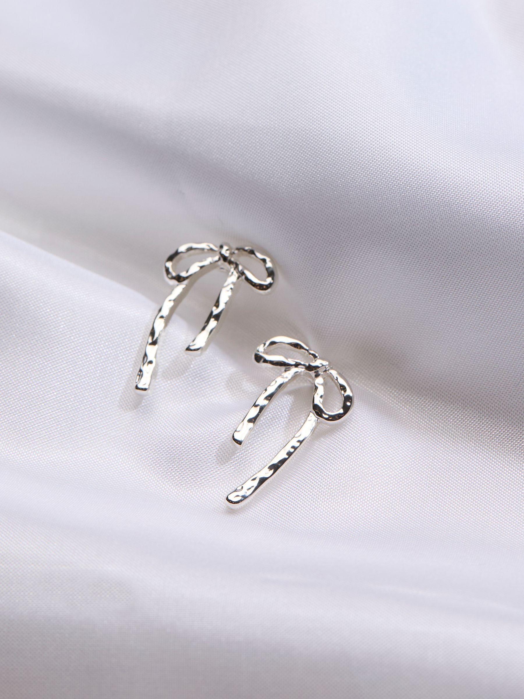Silver Tone Hammered Bow Earrings - Image 2 of 2