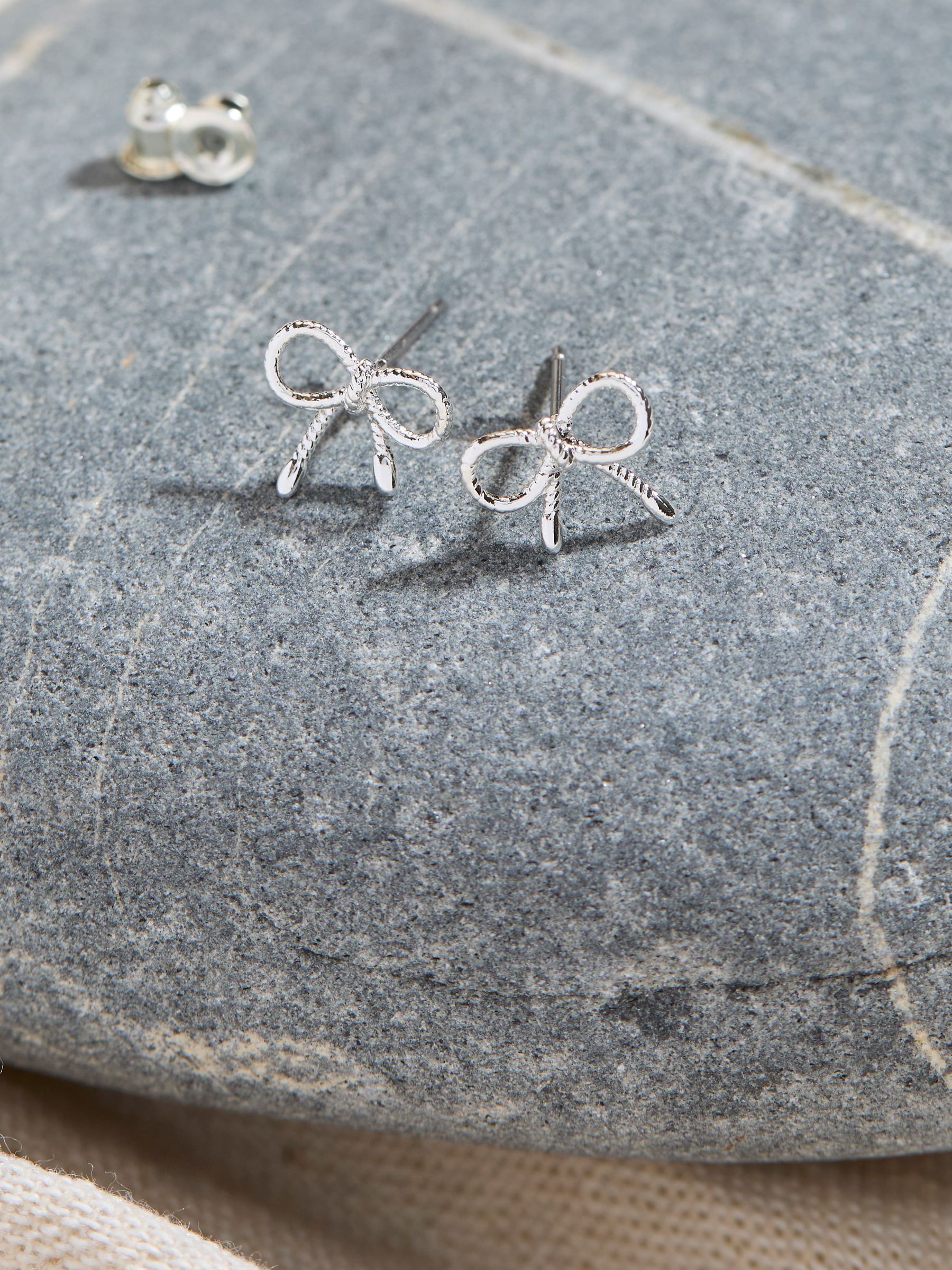 Silver Tone Bow Stud Earrings - Image 2 of 2 Silver Tone Bow Stud Earrings - Image 2 of 2