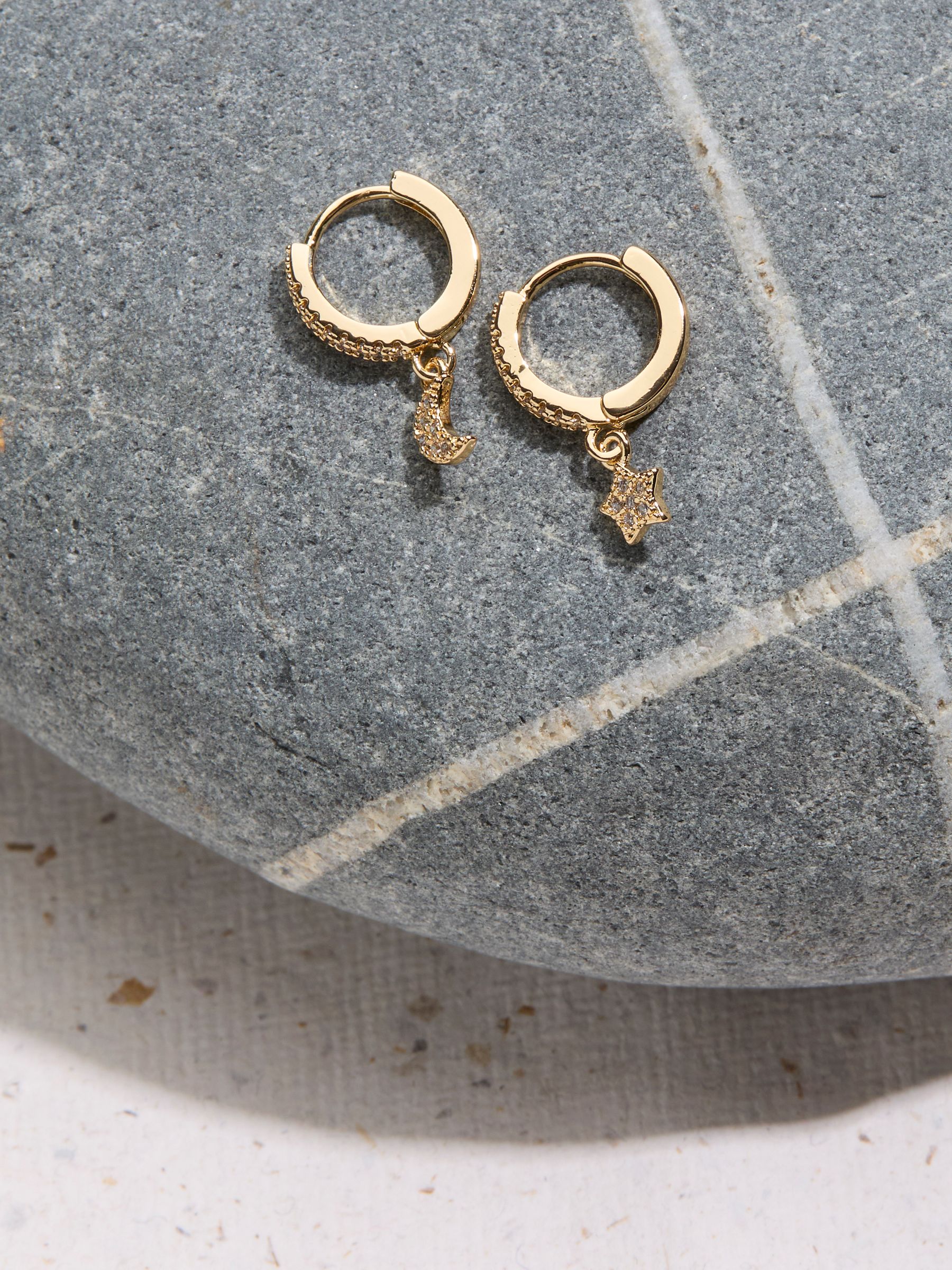 Gold Tone Star and Moon Huggie Earrings - Image 2 of 2