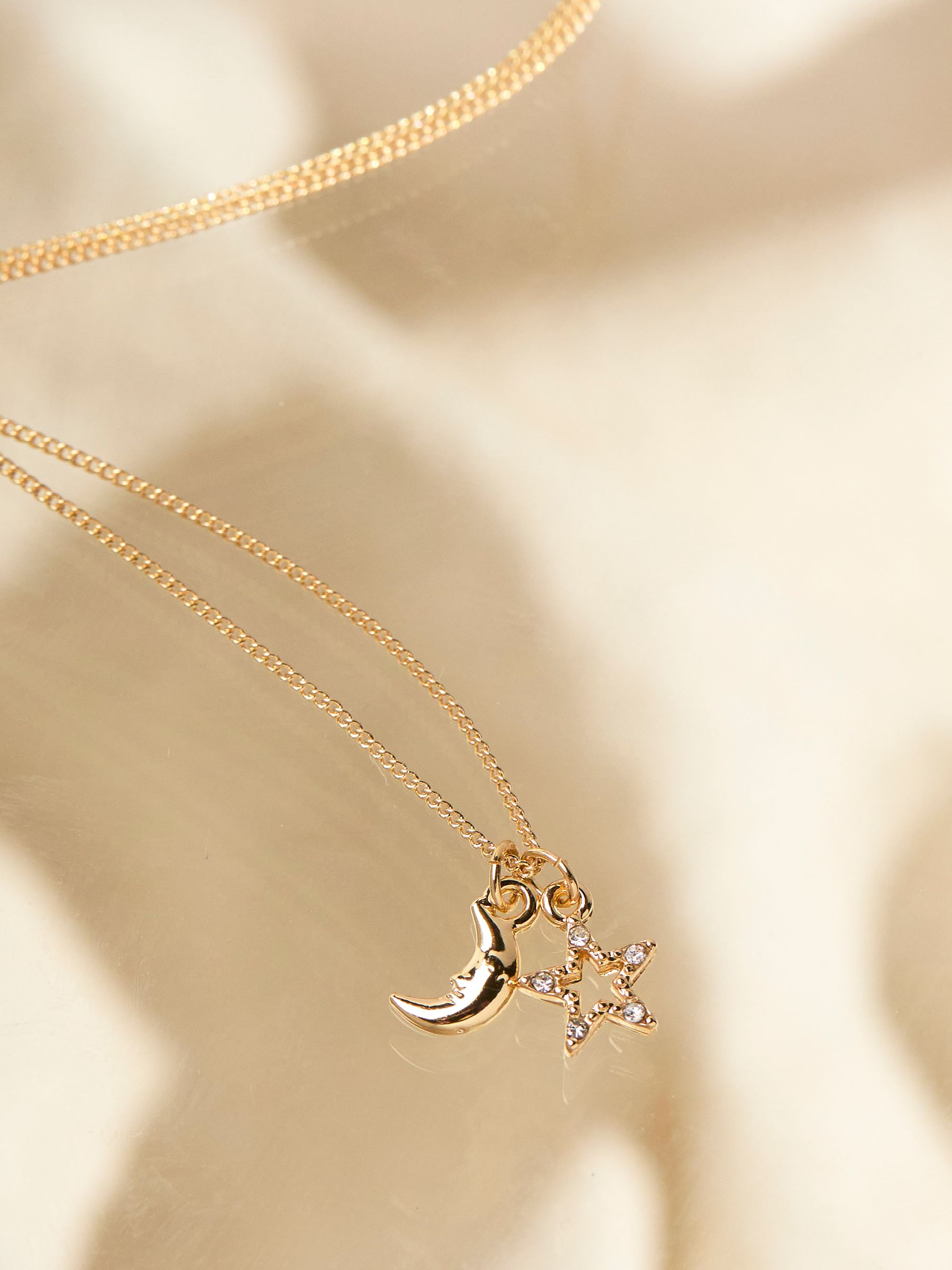 Gold Tone Star and Moon Necklace - Image 2 of 2