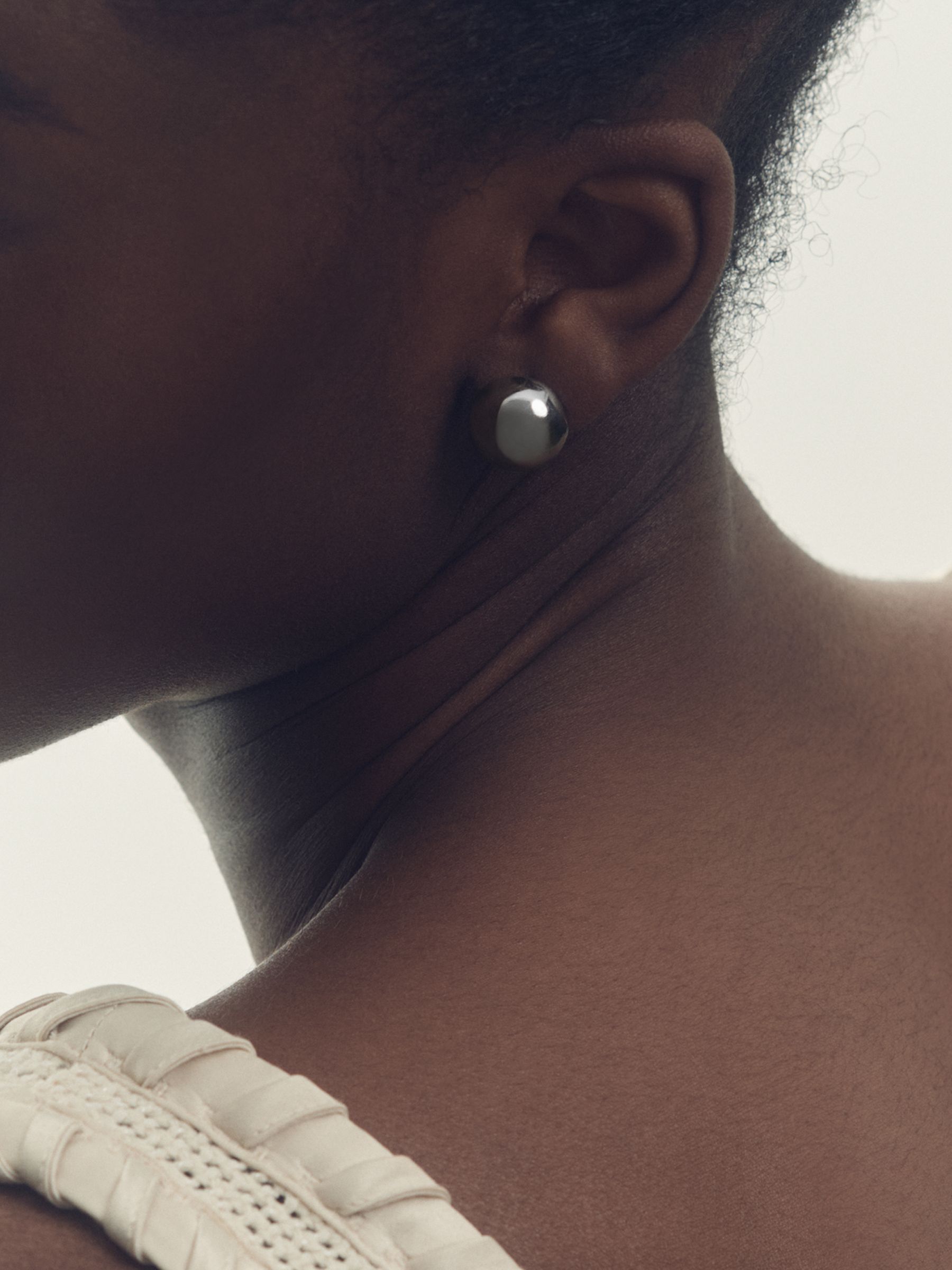 Polished Ball Huggie Earrings in Silver Tone - Image 2 of 4