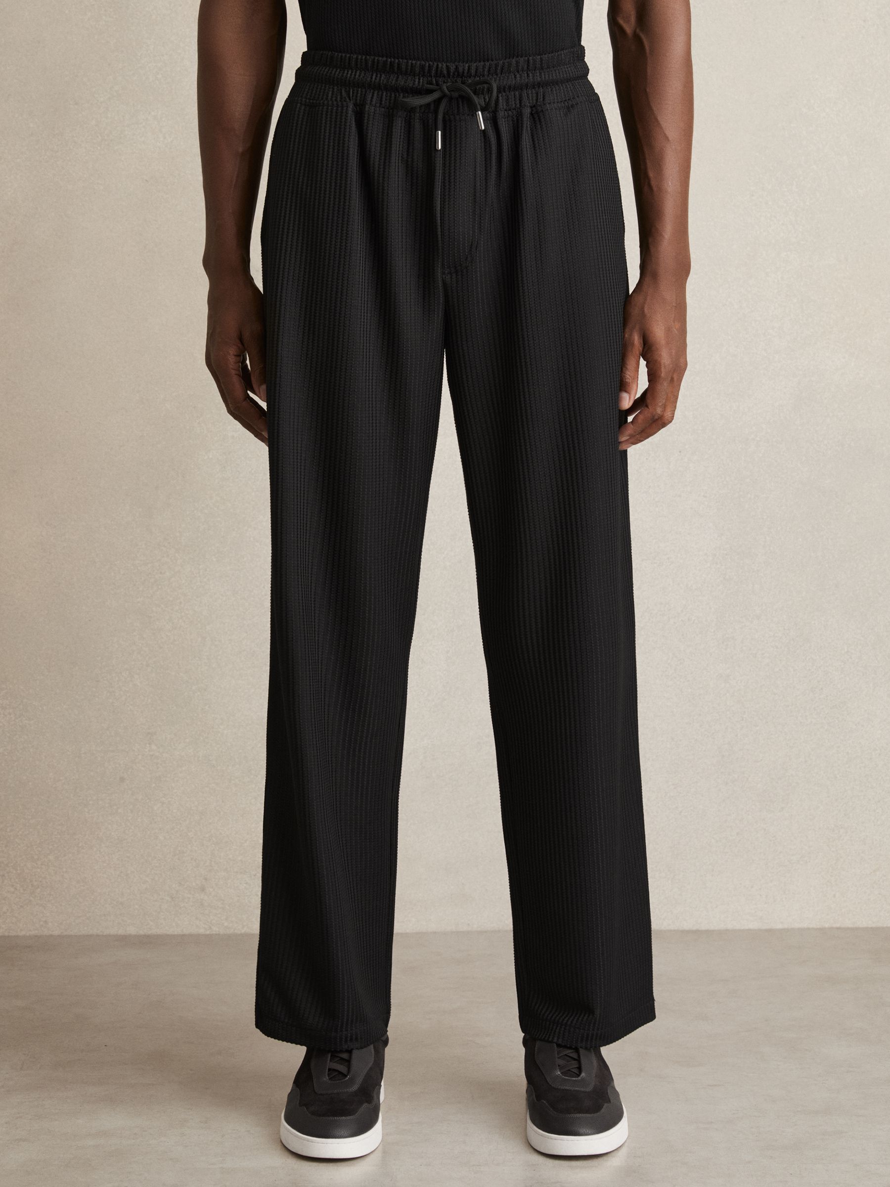 Textured-Knit Tapered Trousers in Black - Image 3 of 6