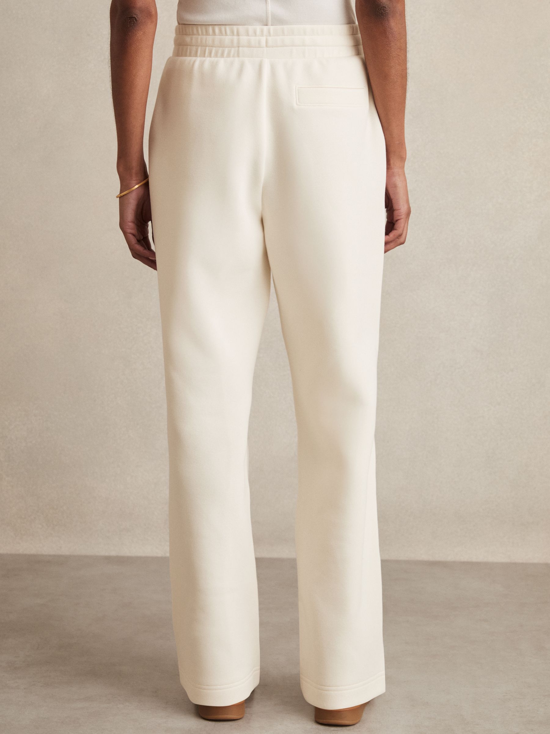 Cotton-Blend Interlock Wide-Leg Joggers in Ivory - image 5