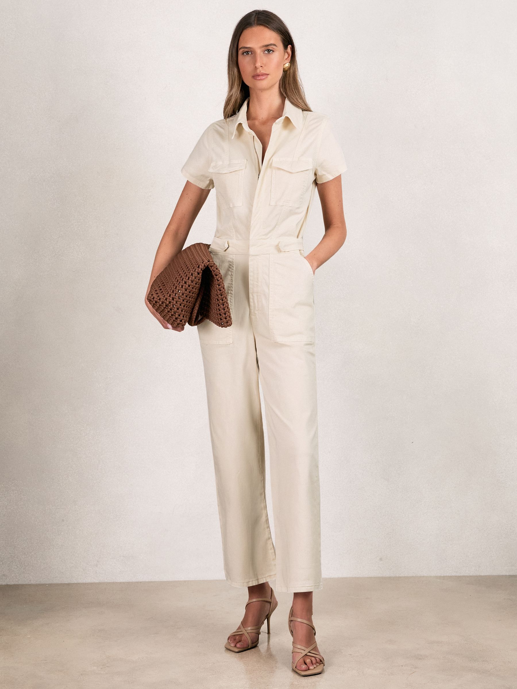 Good American Cotton Twill Jumpsuit with Stretch in Ecru - Image 1 of 5 Good American Cotton Twill Jumpsuit with Stretch in Ecru - Image 1 of 5