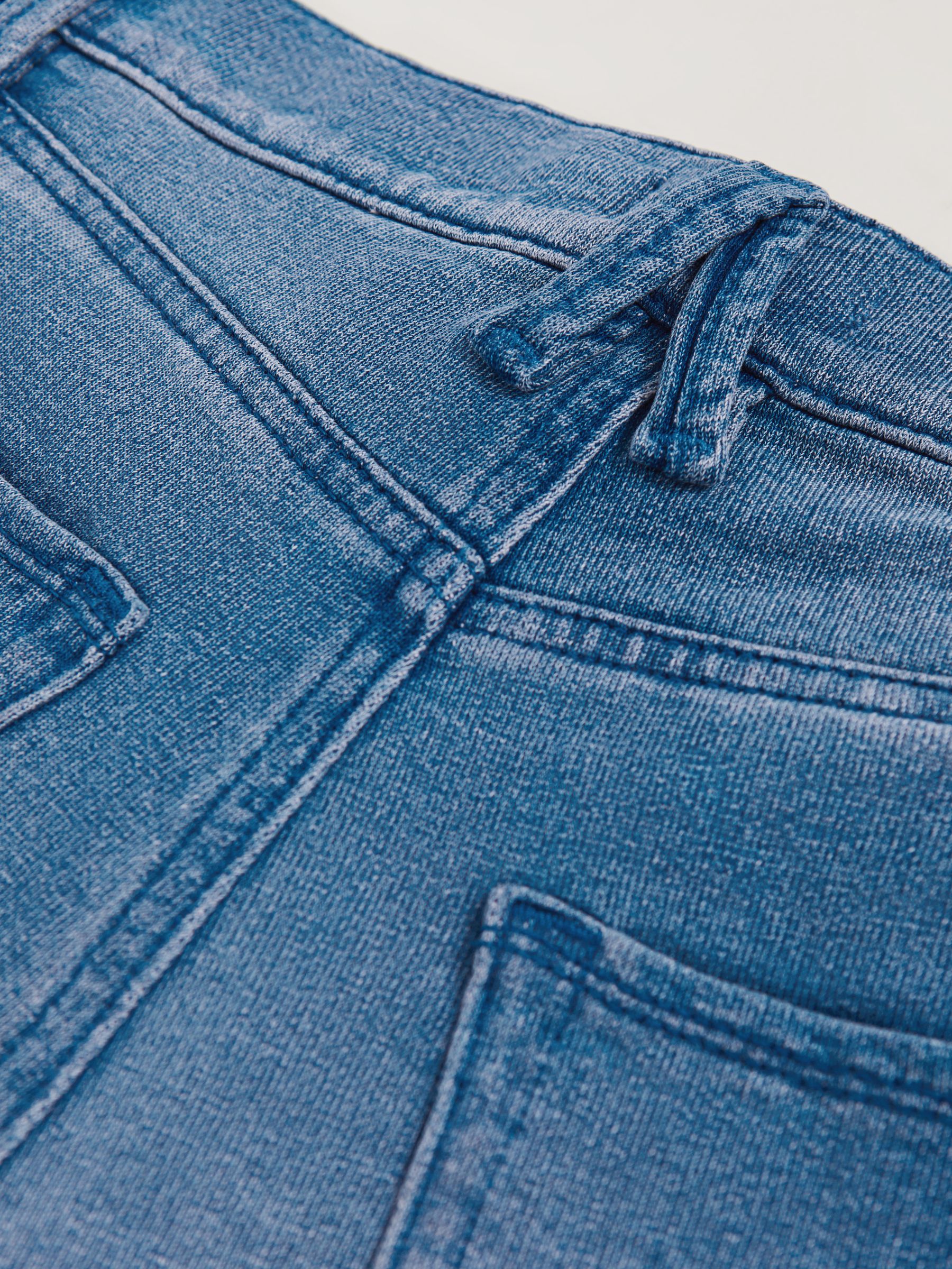 Good American Jeanius Denim Shorts in Indigo Blue - image 5