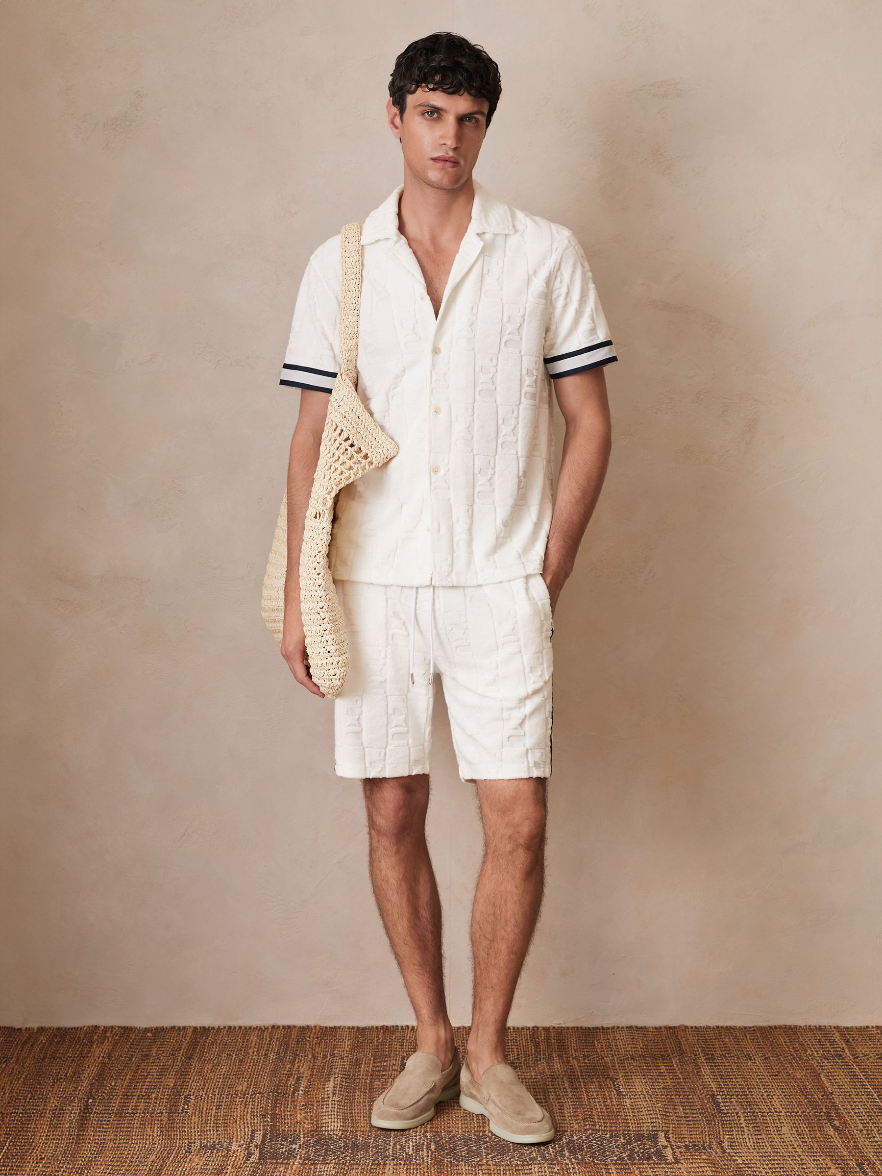 Reiss | Ché Towelling Monogram Shorts in White - Image 1 of 6 Reiss | Ché Towelling Monogram Shorts in White - Image 1 of 6