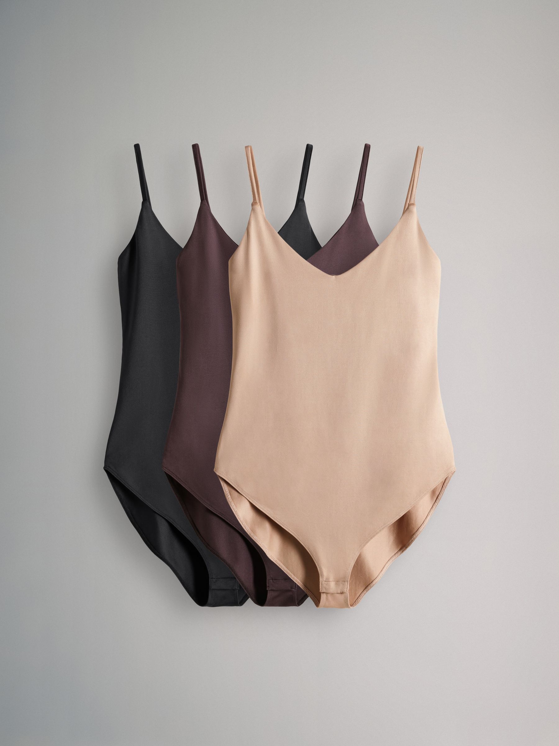 3 Pack Soft Touch Nylon Strappy Vest Bodysuits - Image 2 of 12 3 Pack Soft Touch Nylon Strappy Vest Bodysuits - Image 2 of 12