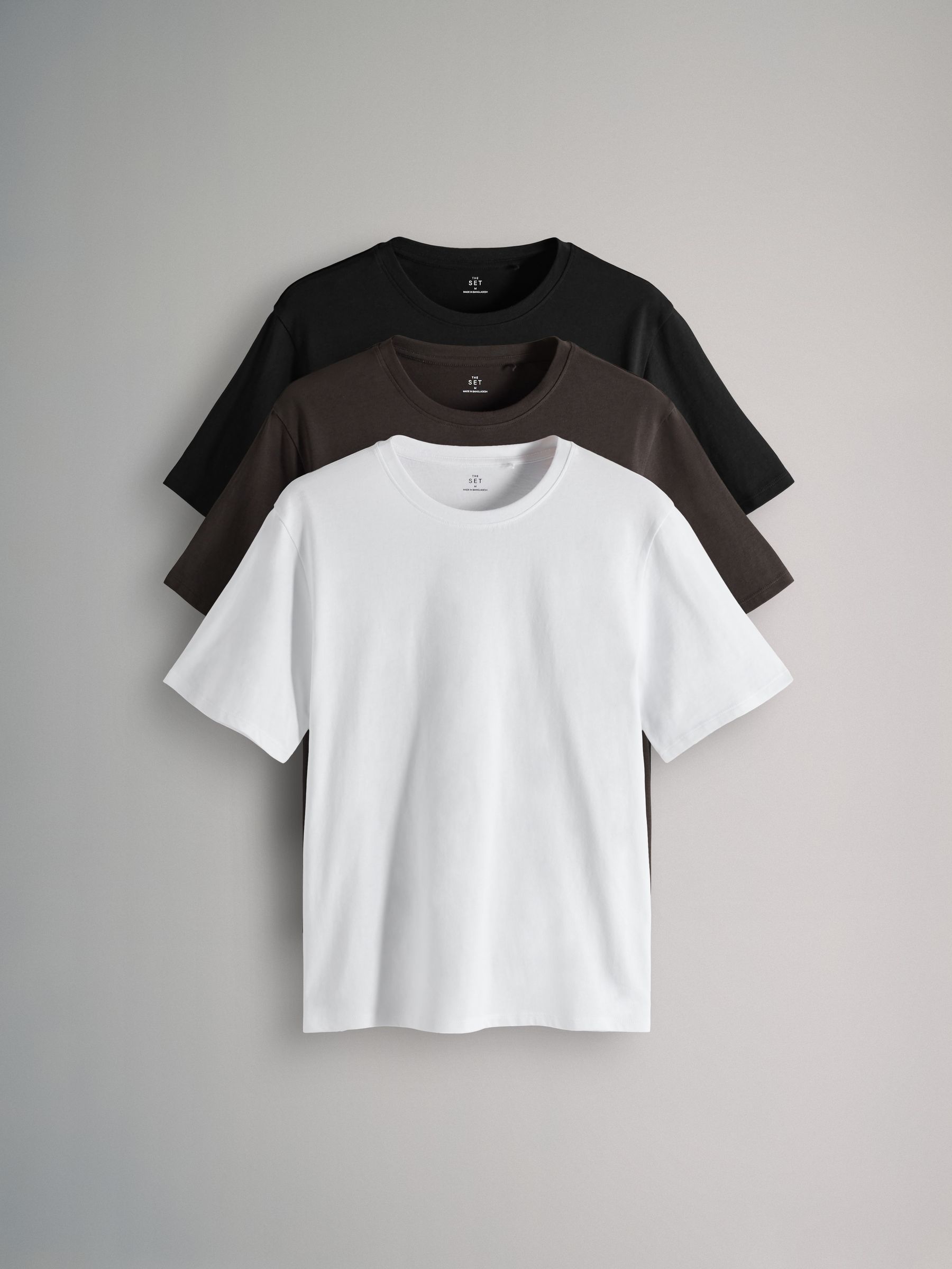 Black/Chocolate Brown/White - 3 Pack Relaxed Short Sleeved 100% Cotton T-Shirts - Image 1 of 6 Black/Chocolate Brown/White - 3 Pack Relaxed Short Sleeved 100% Cotton T-Shirts - Image 1 of 6