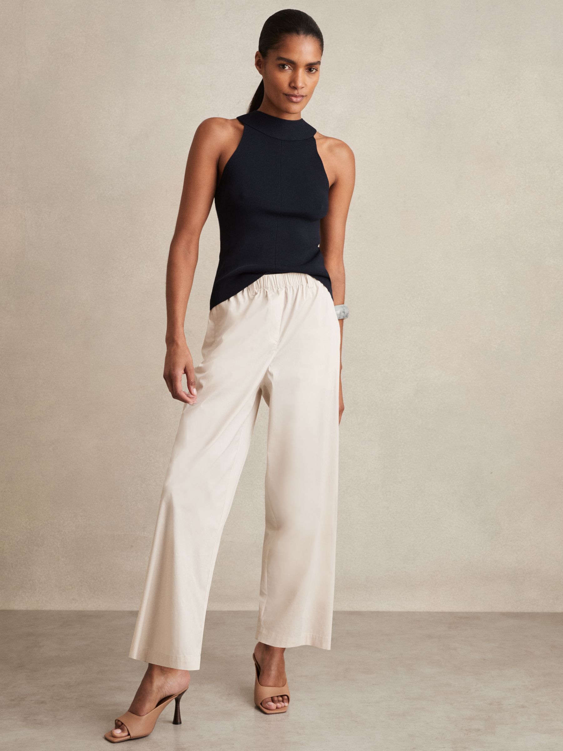 Cotton-Blend Cropped Tapered Trousers in Stone - Image 1 of 6